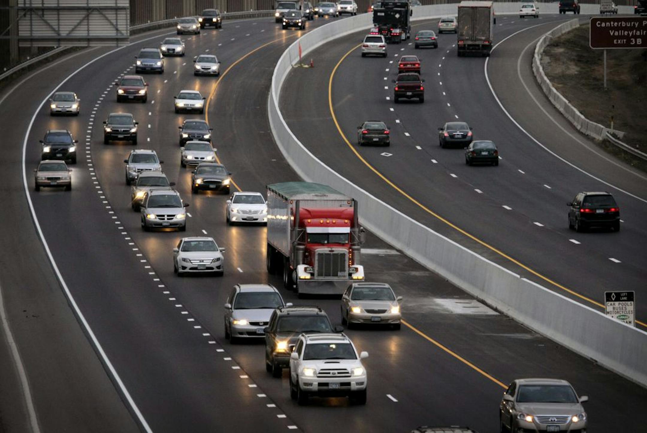 The newly opened segment of MnPass lanes on I-35W in Burnsville. Evening rush hour traffic heading south between Burnsville Parkway and McAndrews Rd.