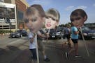 Taylor Swift fans crossed Kellogg Boulevard outside the Xcel Energy Center before a concert in 2013. The Minnesota Wild wants to hang a giant temporar