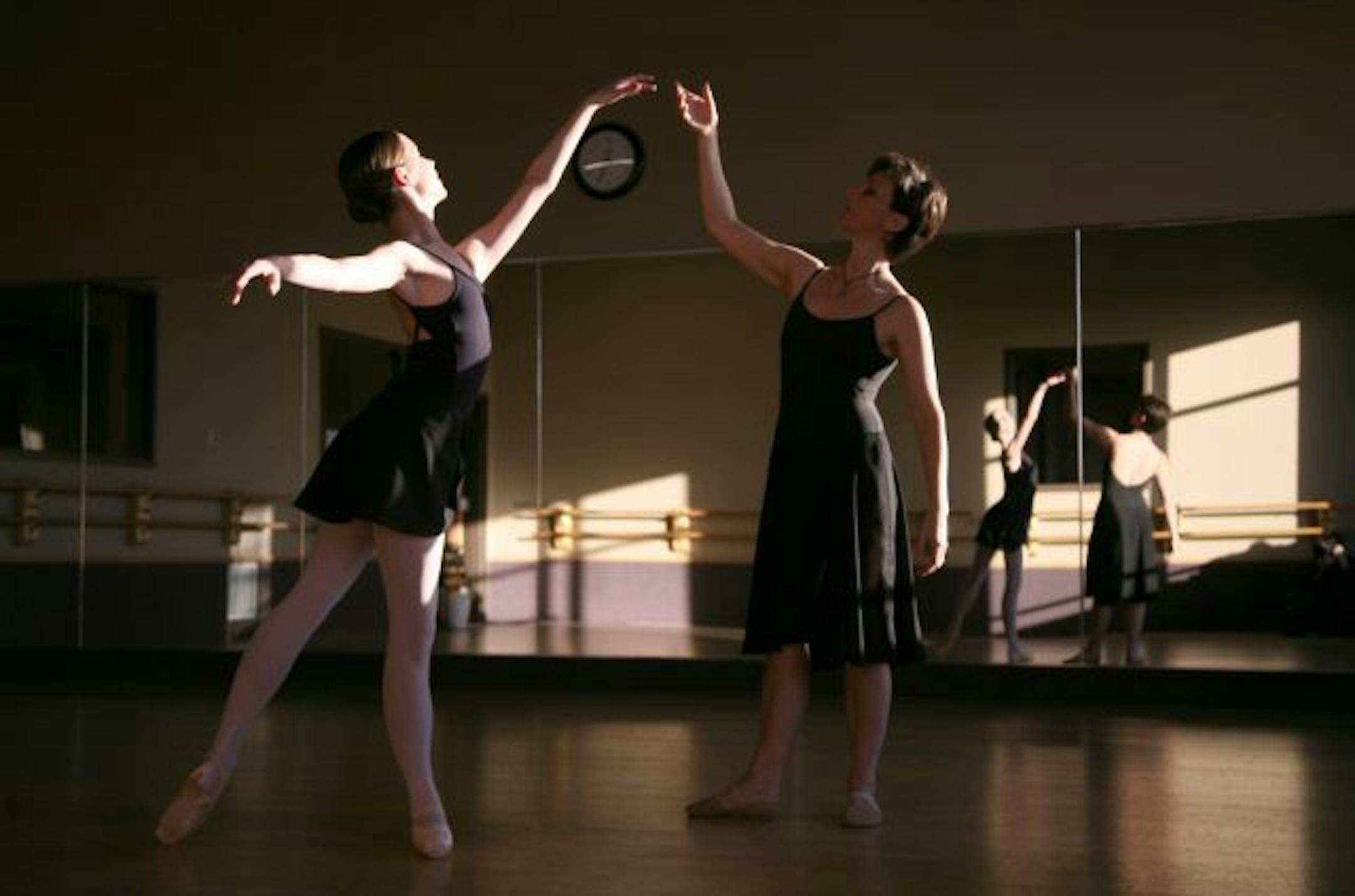 Lakeville City Ballet Director Denise Vogt worked with Emily DeLay, one of the lead dancers in this year's Nutcracker, before class Friday evening in her studio at the DanceWorks Performing Arts Center in Lakeville.