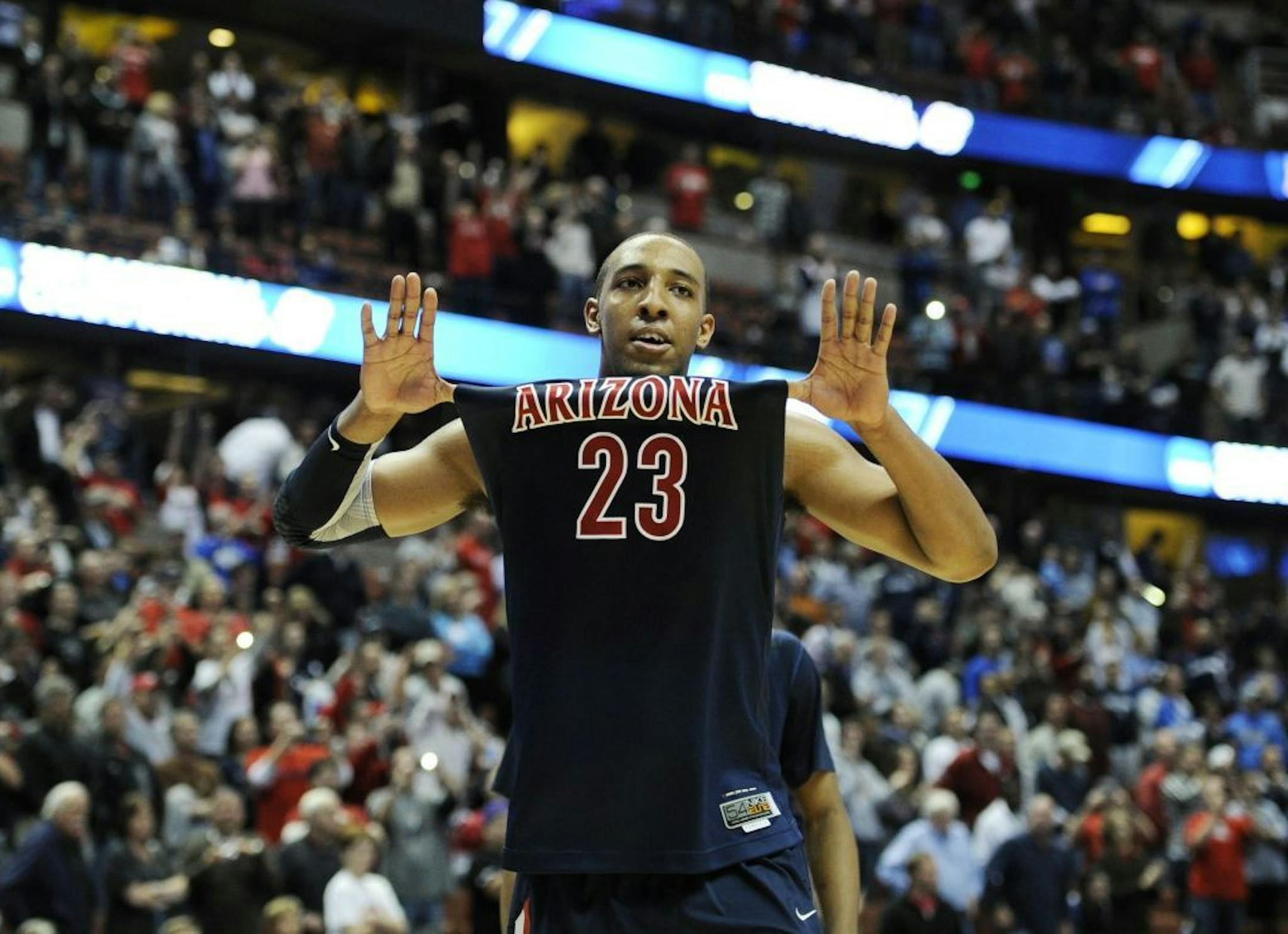 Arizona's Derrick Williams (23) reacts while taking on Duke during the second half of a West regional semifinal game in the NCAA college basketball tournament, Thursday, March 24, 2011, in Anaheim, Calif. Arizona defeated Duke 93-77.