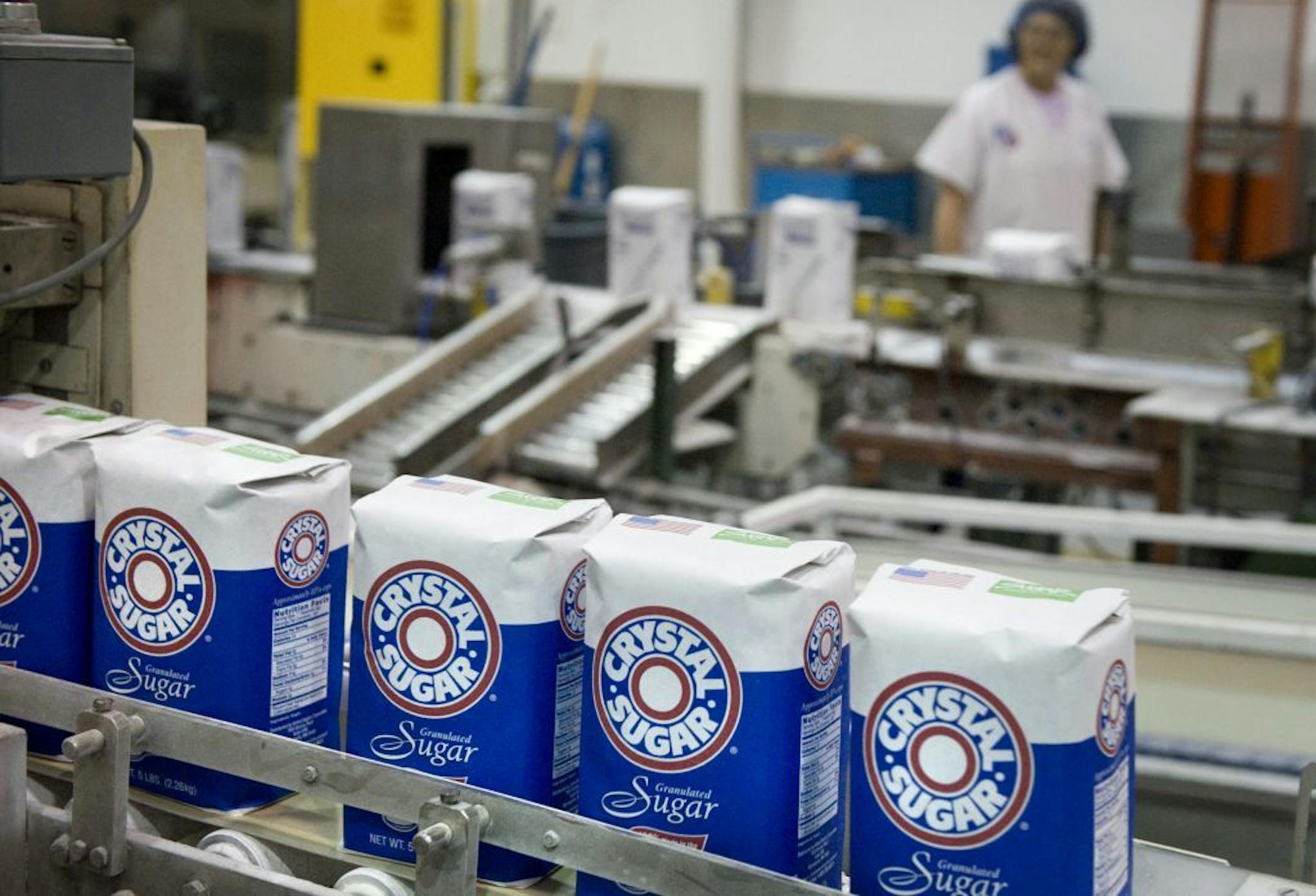 American Crystal Sugar gave the U.S. government 195 million pounds of sugar to pay back $46.6 million in federal loans.