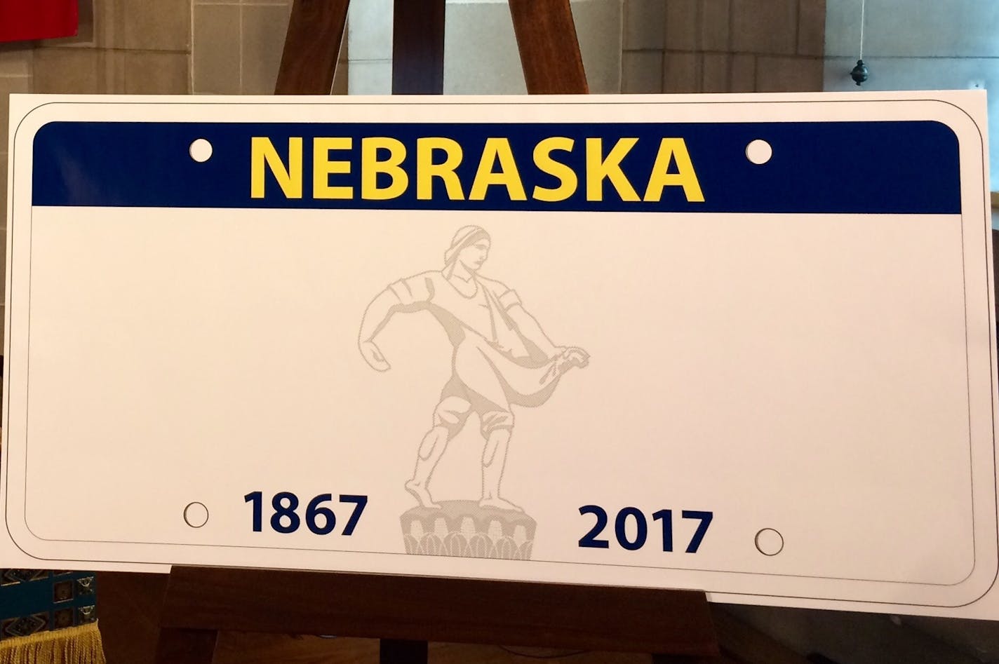 The design of the new Nebraska license plate is shown at a news conference Tuesday in Lincoln.