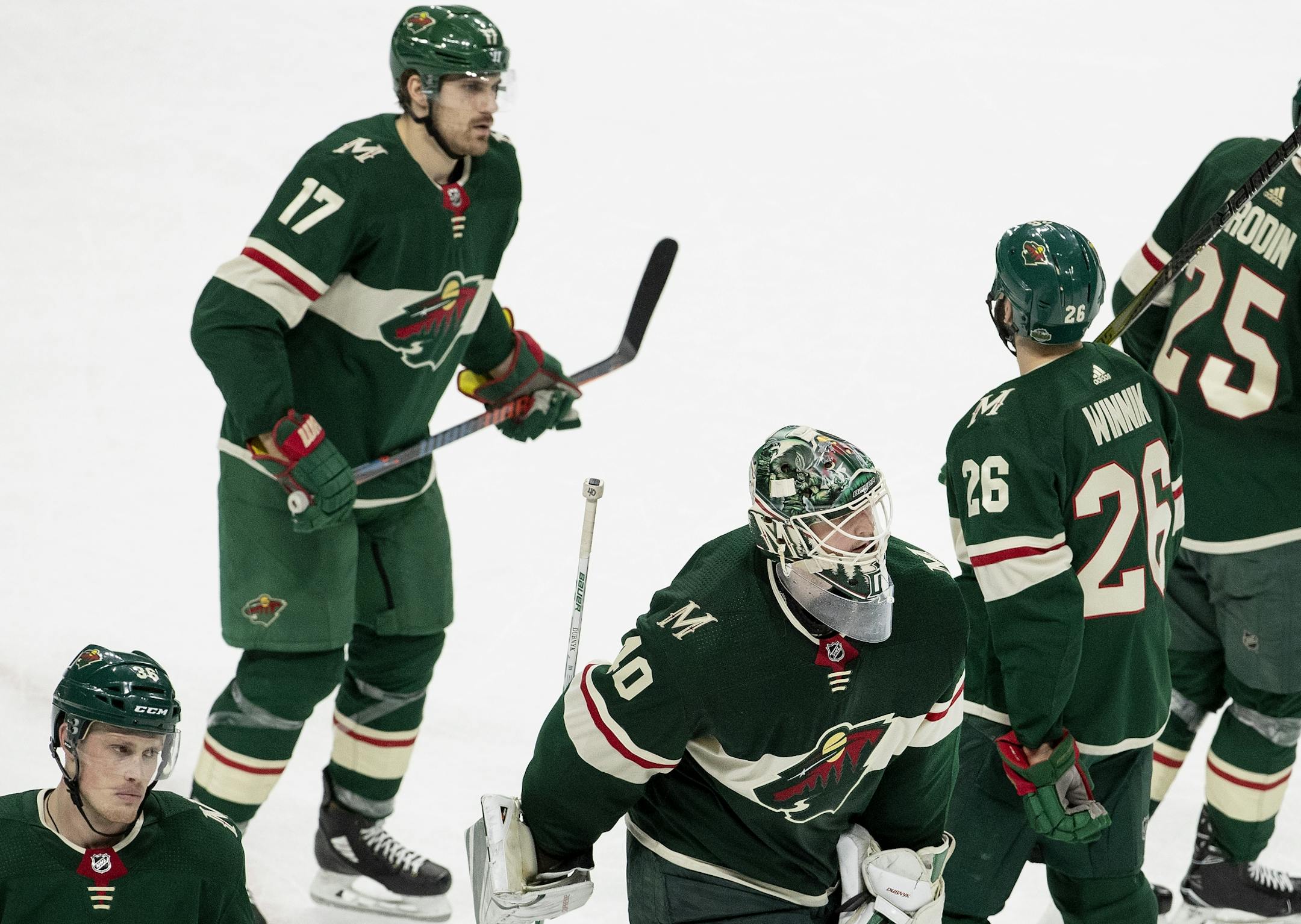Minnesota Wild players skated off the ice at the end of the game. Winnipeg beat Minnesota 2-0.