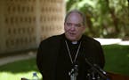 Archbishop Bernard Hebda speaks to the media about the archdiocese's bankruptcy plan Thursday, May 26 2016 in St. Paul, MN.