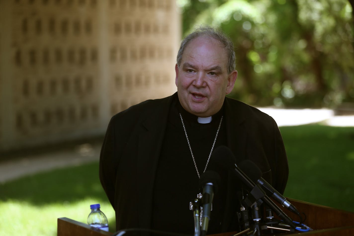 Archbishop Bernard Hebda speaks to the media about the archdiocese's bankruptcy plan Thursday, May 26 2016 in St. Paul, MN.