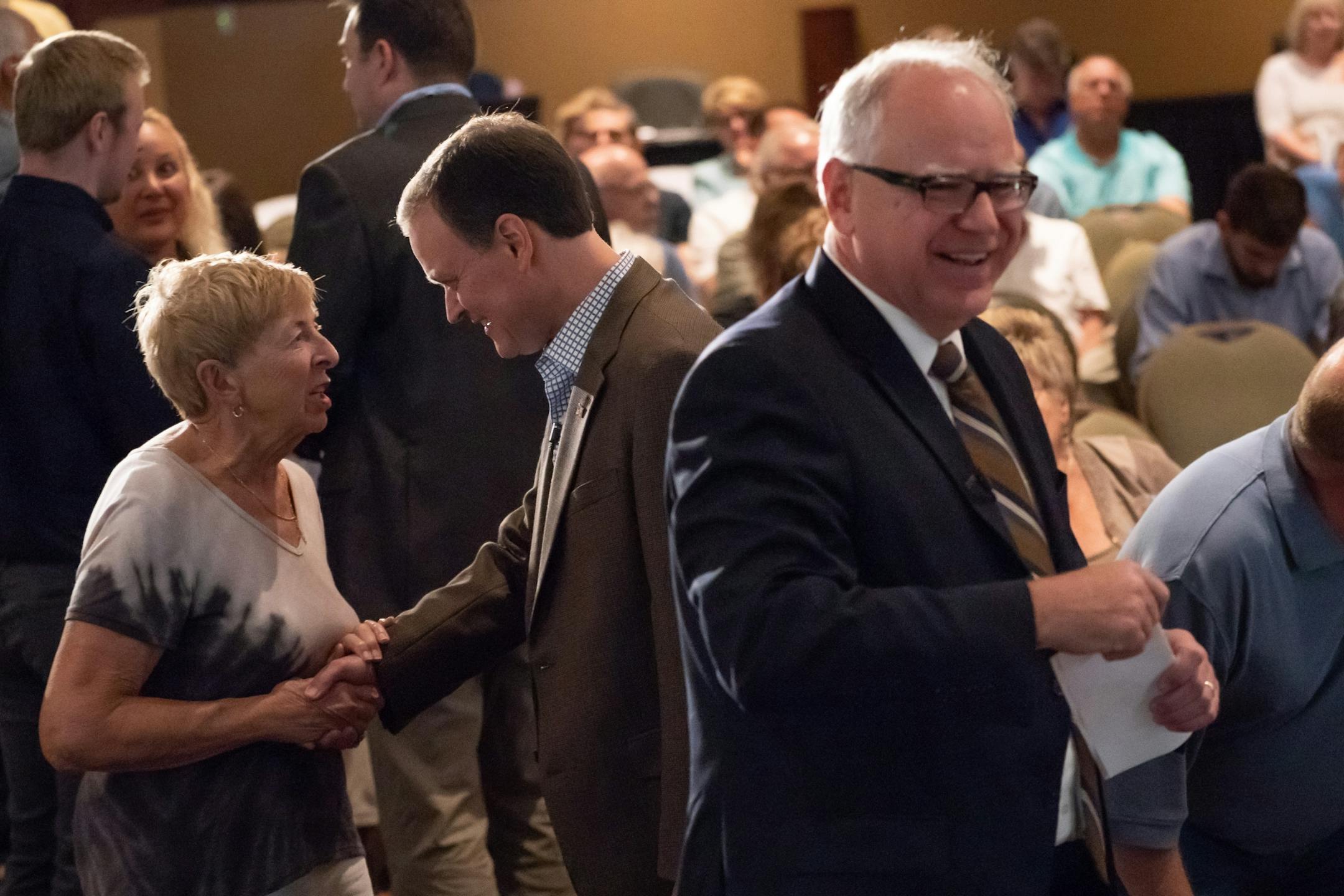 Candidates for governor Tim Walz and Jeff Johnson mingled with the audience before their first debate at Grand View Lodge, Nisswa, MN. Tom Hauser of KSTP moderated the debate.