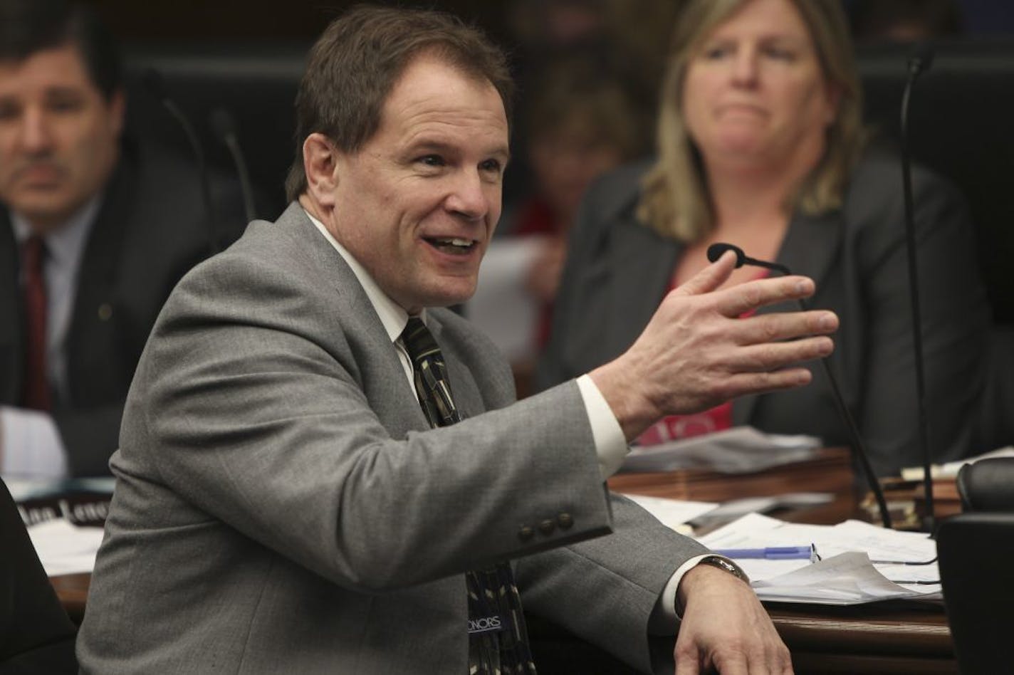 State DFL Reps. Paul Marquart (front), and Rep. Ann Lenczewski