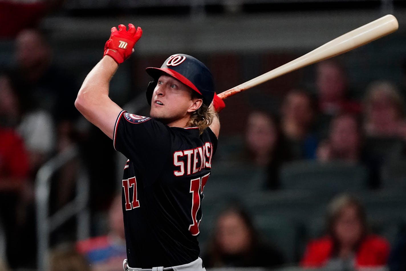 Washington Nationals center fielder Andrew Stevenson (17) is shown a baseball game against the Atlanta Braves Wednesday, Sept. 8, 2021, in Atlanta. (AP Photo/John Bazemore)