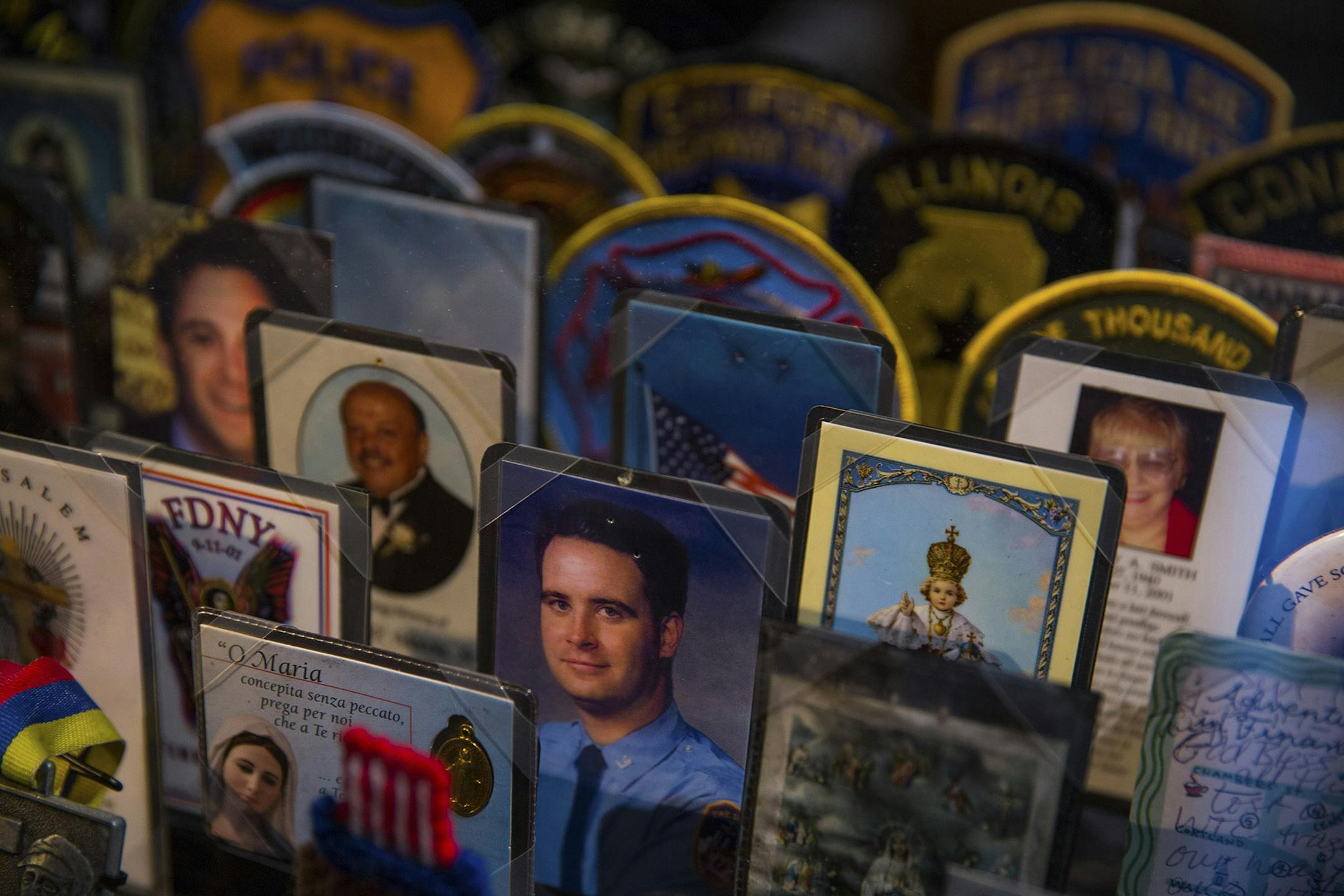 Mementos of loved ones lost in the 9/11 attacks now on display at the National September 11 Memorial Museum in New York, May 12, 2014. Donated by family members, the many small personal effects of victims are among the most poignant and difficult artifacts in a museum that may present an emotionally overwhelming experience for guests when it opens on May 21. (Damon Winter/The New York Times) ORG XMIT: MIN2014051511212674