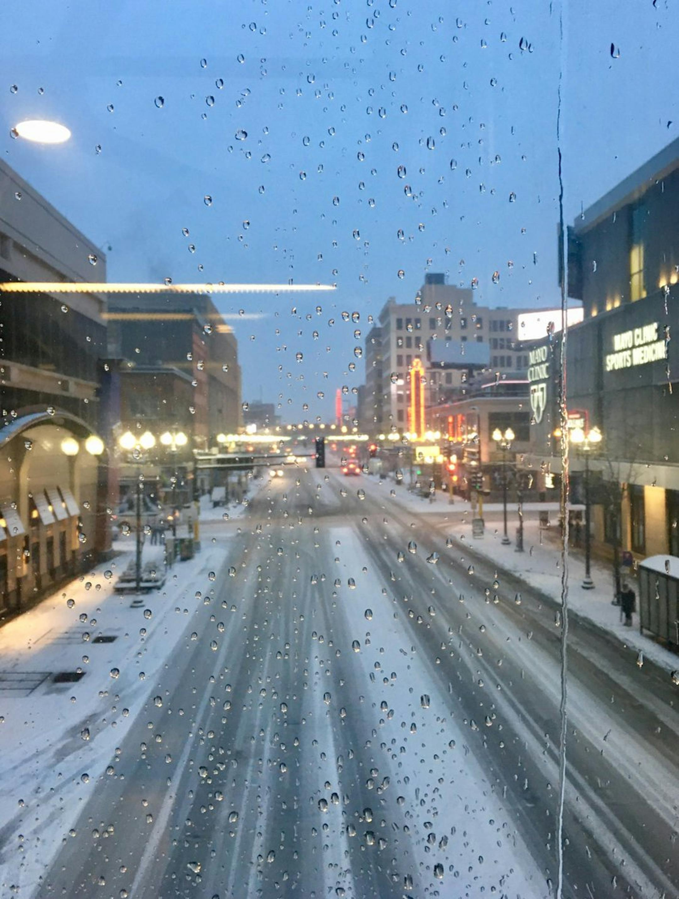 Downtown Minneapolis emptied out early with many shops closed as the snowstorm arrived this afternoon.