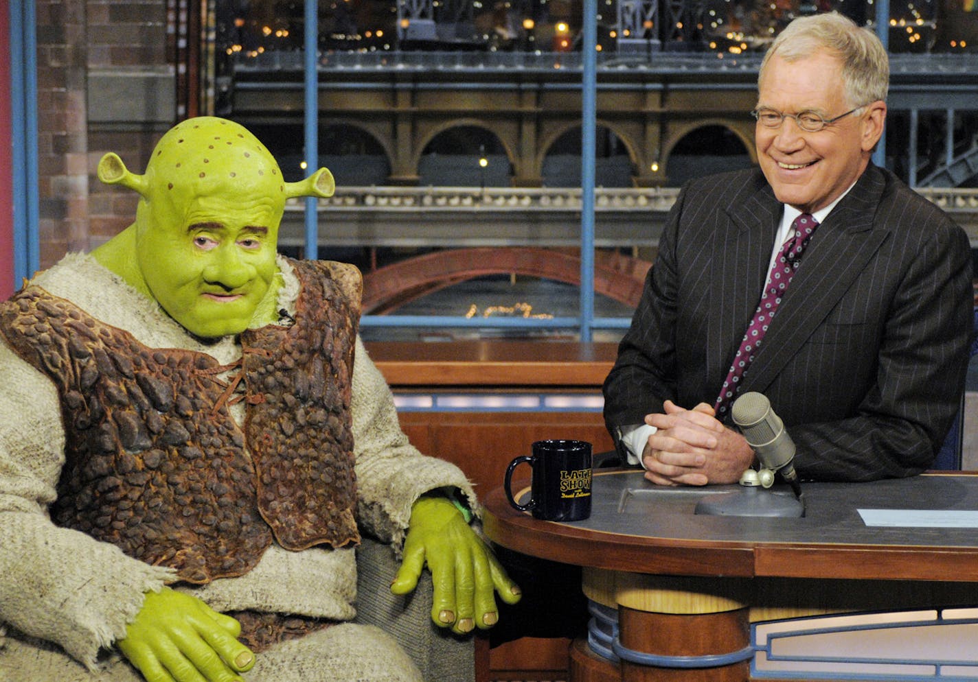 Regis Philbin dressed as Shrek stops by to chat with Dave on the Late Show with David Letterman Wednesday April 22, 2009 on the CBS Television Network. This photo is provided by CBS from the Late Show with David Letterman photo archive. Photo: Jeffrey R. Staab/CBS &#x221a;?&#xac;&#xa9;2009 CBS Broadcasting Inc. All Rights Reserved