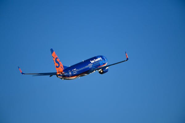 A Sun Country Airlines jet takes off from Minneapolis St. Paul International Airport.