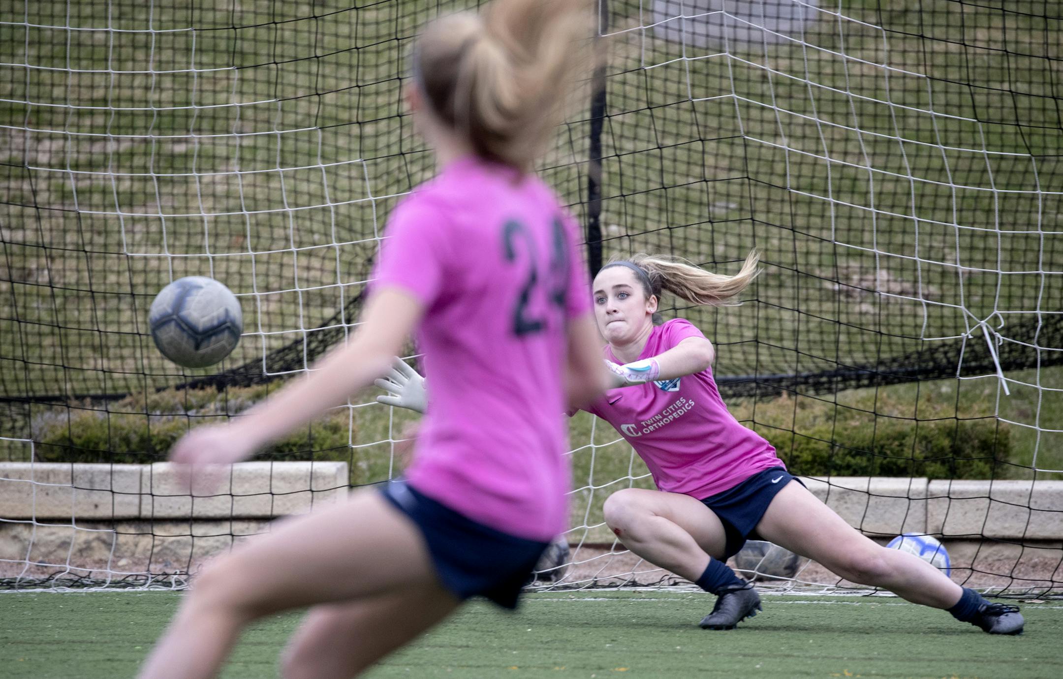 Minnesota Thunder Academy goalie Bayliss Flynn (1) and forward Maddie Dahlien (24). ] CARLOS GONZALEZ • cgonzalez@startribune.com – Edina, MN – April 6, 2020,
Lakeville North and Edina girls' soccer stars Bayliss Flynn and Maddie Dahlien, both of whom run track, talk about the navigating both sports through these uncertain times. Maddy is the forward, Bayliss is the goalie. They are club soccer teammates with the MN Thunder Academy.
