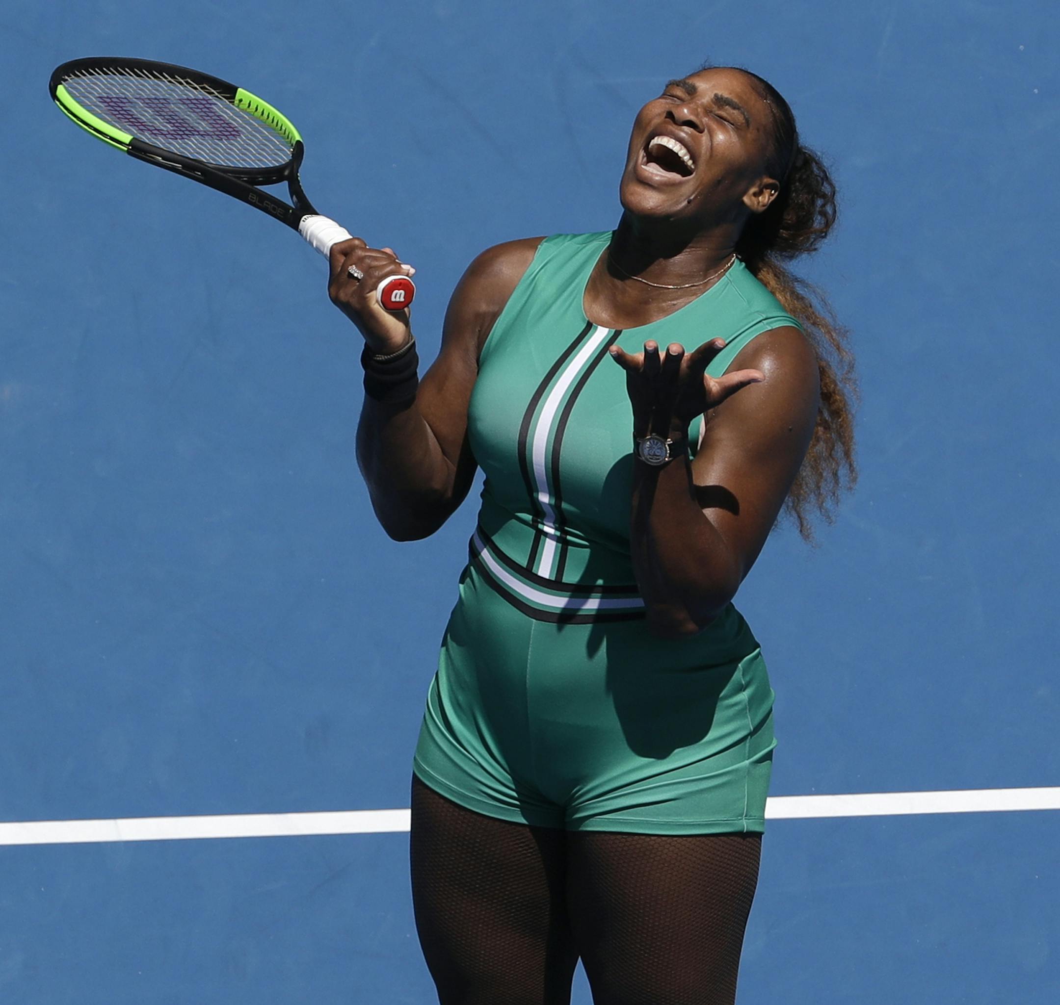 United States' Serena Williams reacts after losing a point to Karolina Pliskova of the Czech Republic during their quarterfinal match at the Australian Open tennis championships in Melbourne, Australia, Wednesday, Jan. 23, 2019. (AP Photo/Mark Schiefelbein)