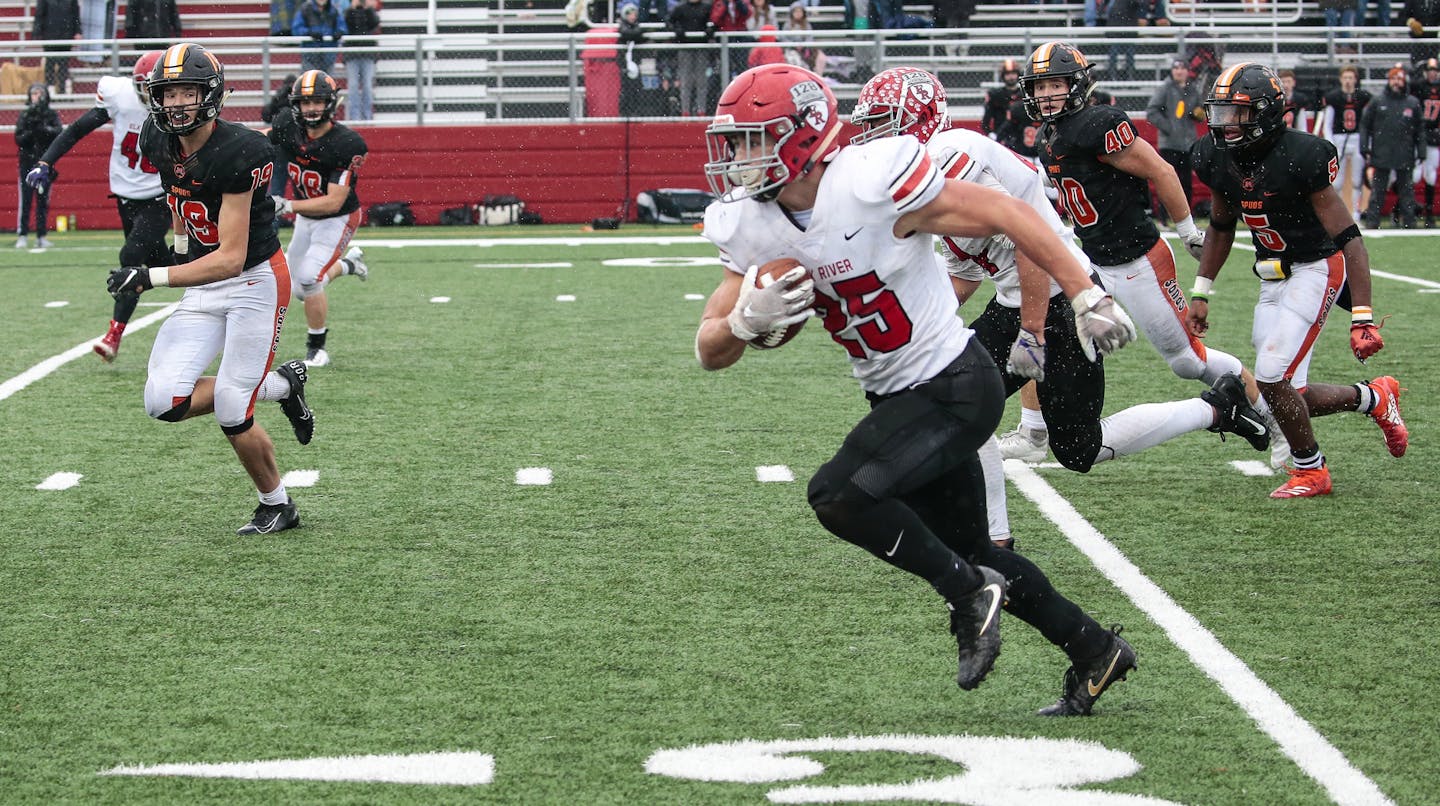 Elk River quarterback Beau Ruby completed the only pass he threw all game, connecting with teammate Carter Otto for a game-winning 57-yard touchdown in the final seconds of a Class 5A quarterfinal game for a 58-55 victory against Moorhead on Nov. 9 at Monticello High School. Photo by Cheryl A. Myers, SportsEngine