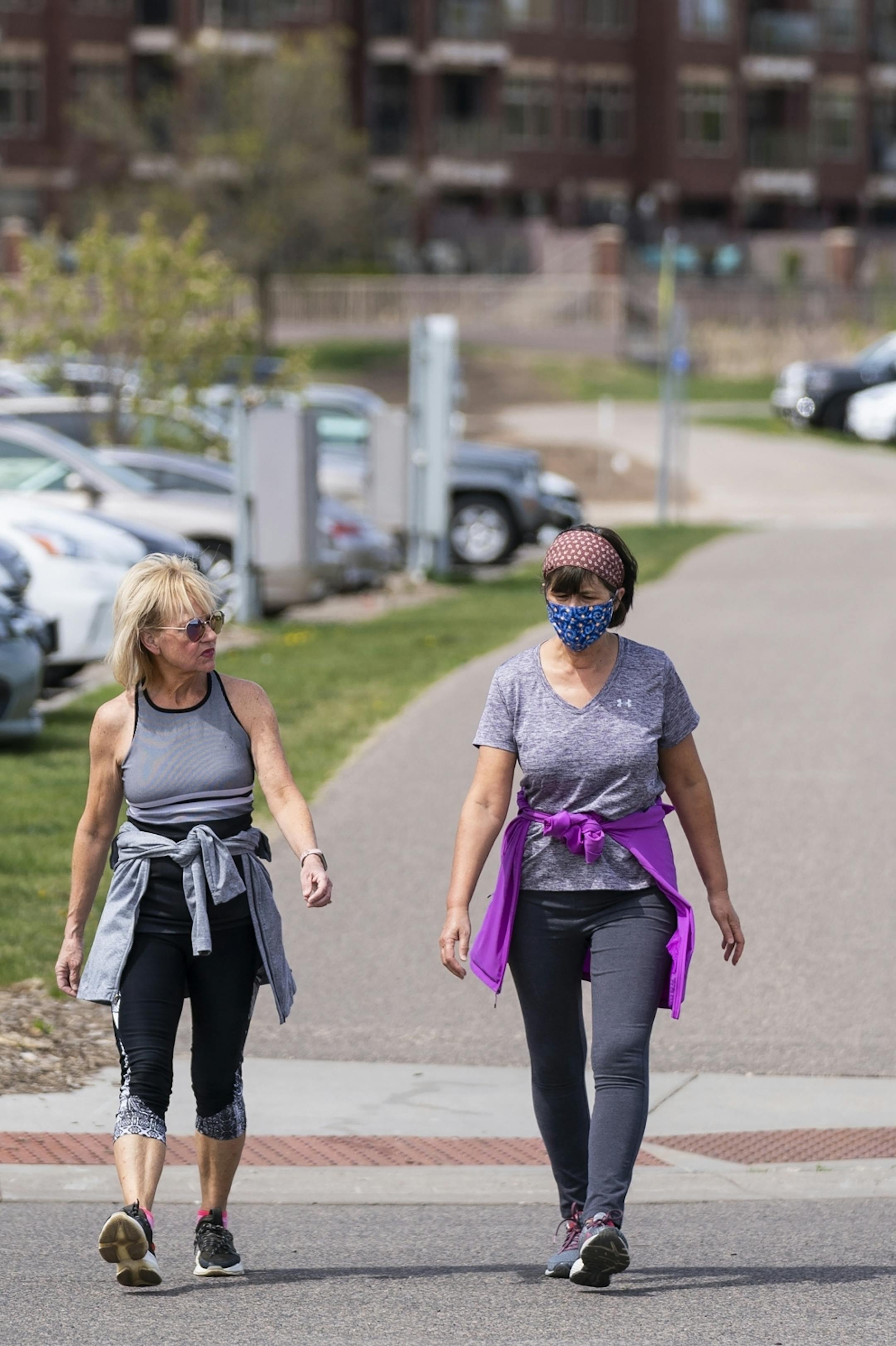 Laurie Cherry, left, of Lake Elmo and Boni Iverson of Hudson, Wis. took advantage of a quiet day along the St. Croix River in downtown Stillwater to take a walk.