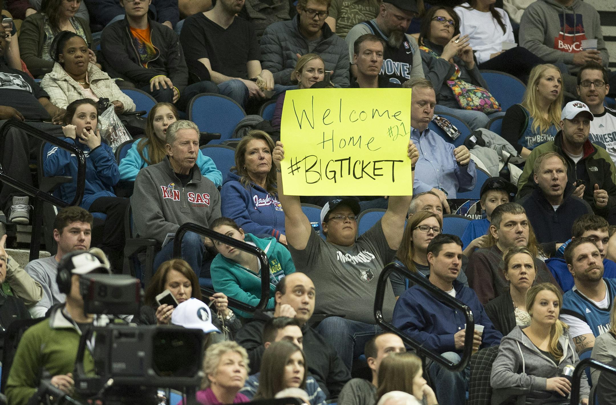 A Kevin Garnett fan proudly raises a sign welcoming home the Big Ticket during the first half of Friday night's game. ] (Aaron Lavinsky | StarTribune) The Phoenix Suns play the Minnesota Timberwolves on Friday , Feb. 20 2015, at Target Center