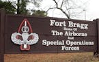 FILE - This Jan. 4, 2020 file photo shows a sign for at Fort Bragg, N.C. The fight over removing the names of Confederate generals from U.S. Army base