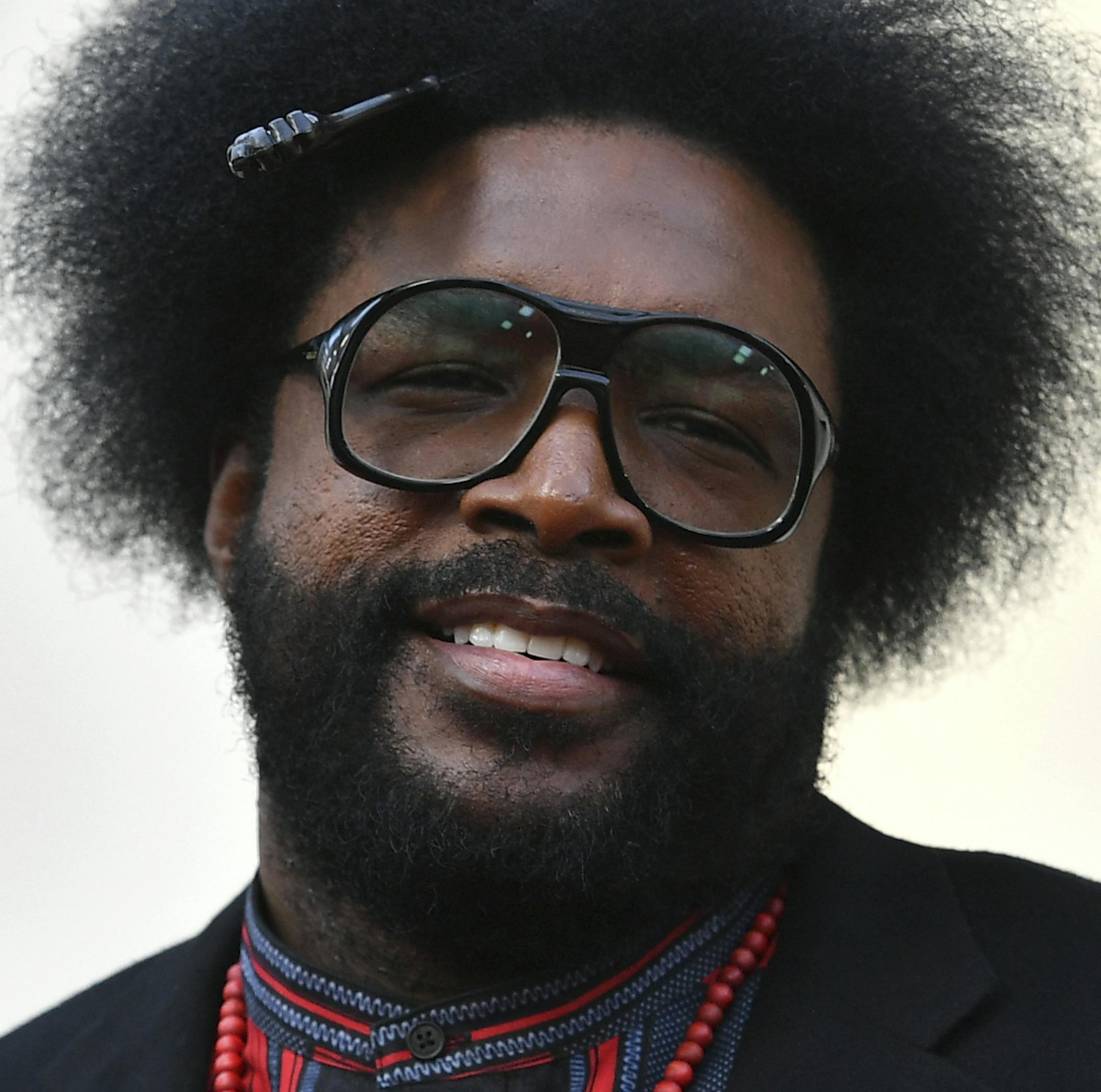 Questlove arrives at the Oscars on Sunday, Feb. 24, 2019, at the Dolby Theatre in Los Angeles. The founder of the hip-hop group The Roots wants to find the woman who bought a turntable and records for him when he was 5. He posted about his quest on social media over the weekend. He wrote that he was in Portland, Maine, in 1976 when he made friends with a stranger. He said he knew talking to strangers was a no-no but says "my instincts paid off." Now he's hoping to find Ellie. (Photo by Jordan St