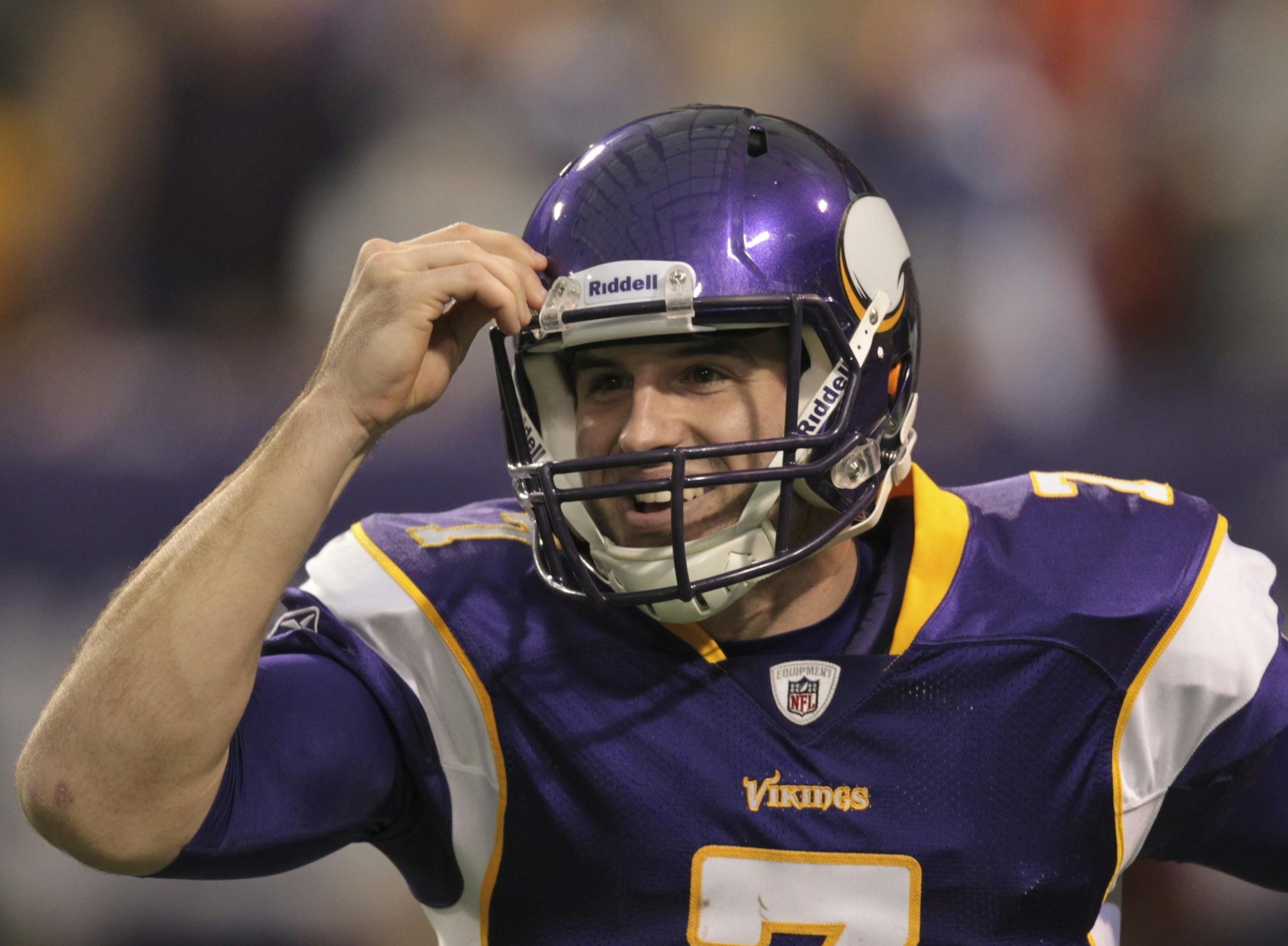 Vikings' quarterback Christian Ponder smiled as he ran back to the bench after connecting with Percy Harvin for a 48 yard touchdown play in the fourth quarter. The Minnesota Vikings lost 35-32 to the Denver Broncos at Mall of America Field in Minneapolis, Minn. on Sunday afternoon, December 4, 2011.
