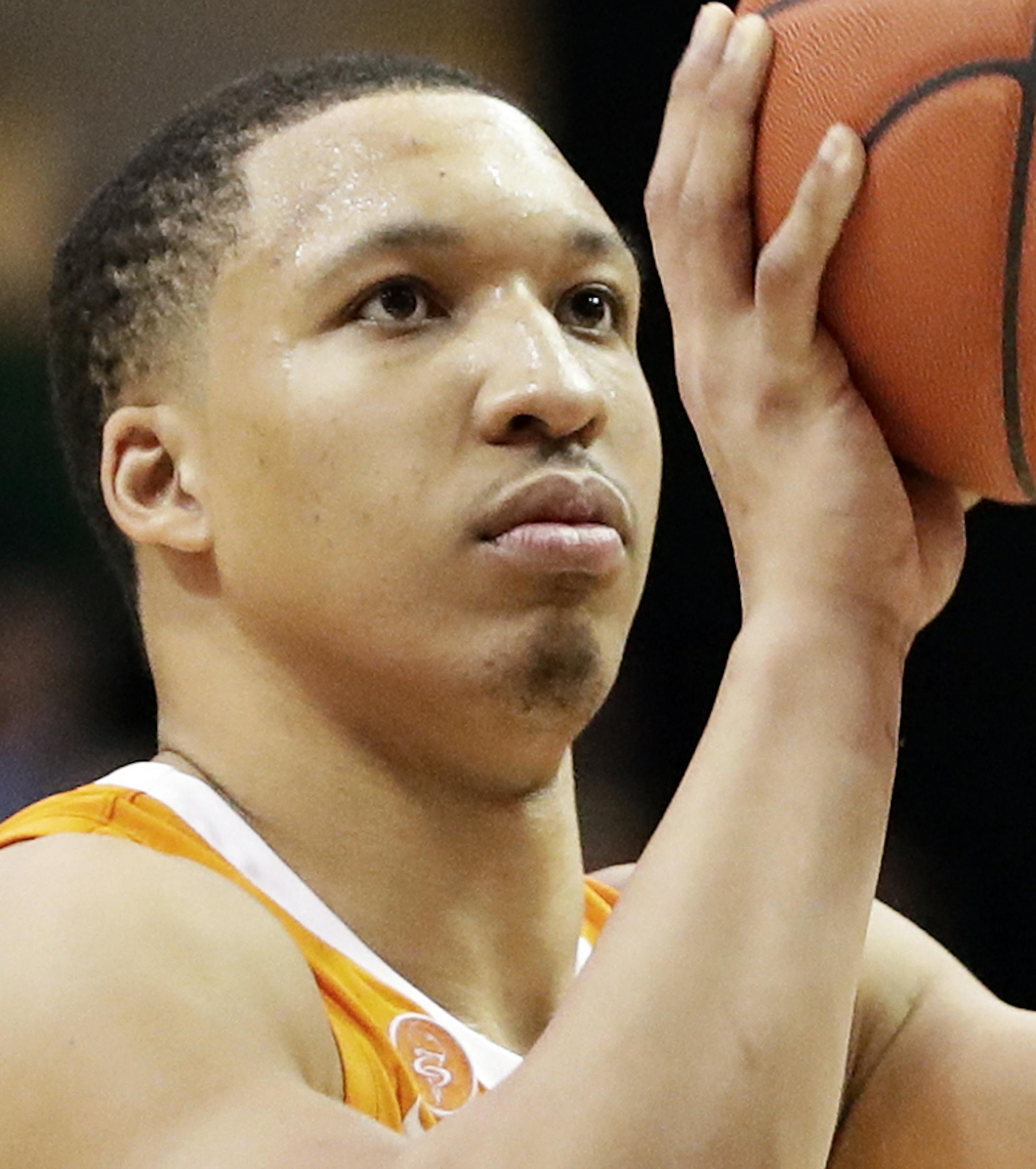Tennessee forward Grant Williams (2) shoots a free throw against Vanderbilt in overtime of an NCAA college basketball game Wednesday, Jan. 23, 2019, in Nashville, Tenn. Williams scored a career-high 41 points and was 23 for 23 at the free-throw line as Tennessee won 88-83 in overtime. (AP Photo/Mark Humphrey)