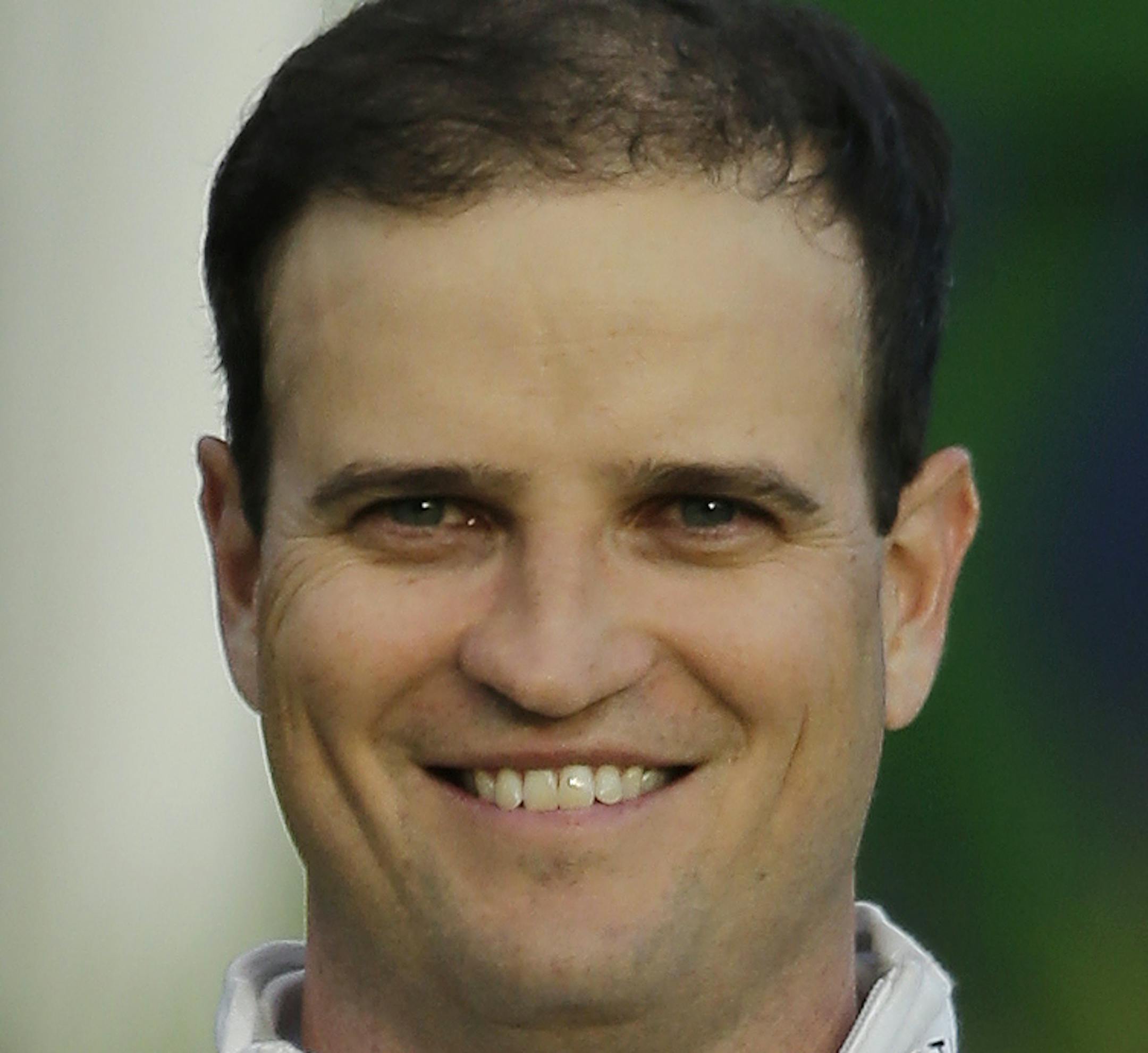 United States’ Zach Johnson poses with the trophy after winning a playoff after the final round at the British Open Golf Championship at the Old Course, St. Andrews, Scotland, Monday, July 20, 2015. (AP Photo/David J. Phillip)