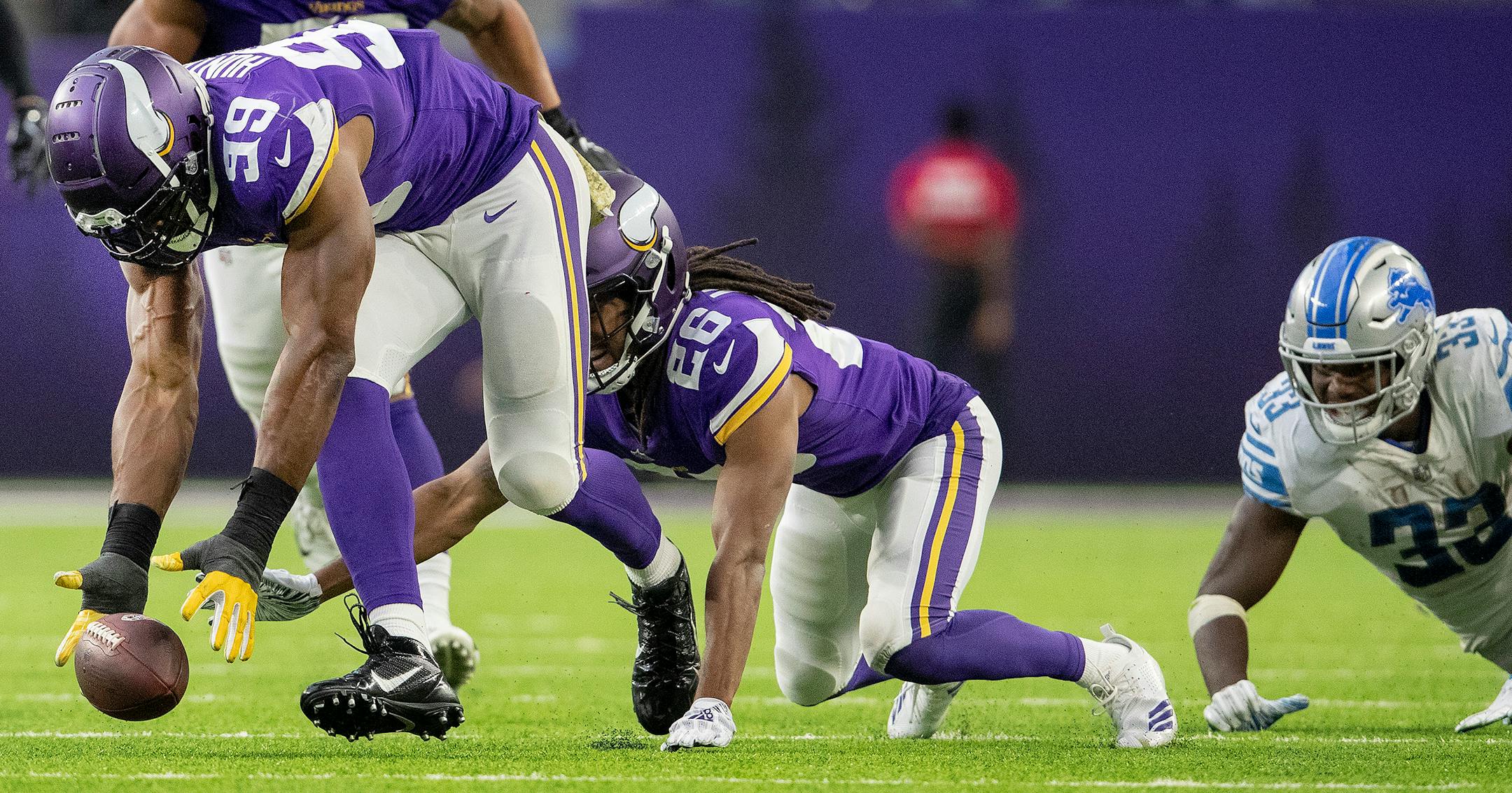 Vikings defensive end Danielle Hunter scooped up a fumble by the Lions' Kerryon Johnson (33) and raced 32 yards for a touchdown in the fourth quarter Sunday.