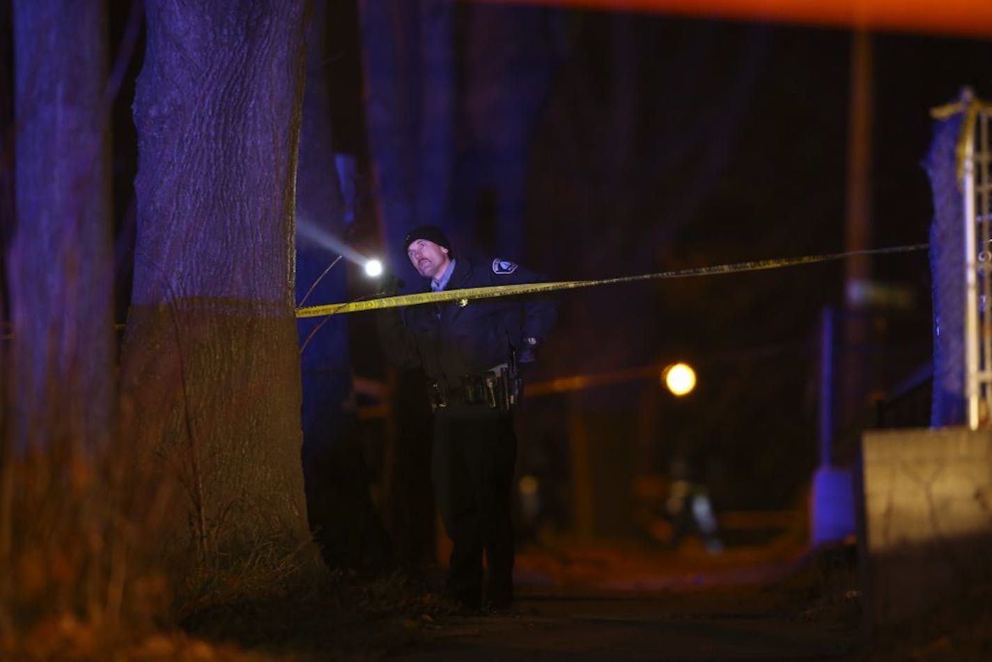 A Minneapolis police officer investigated early Tuesday after the shooting outside the Fourth Precinct station, injuring five protesters.