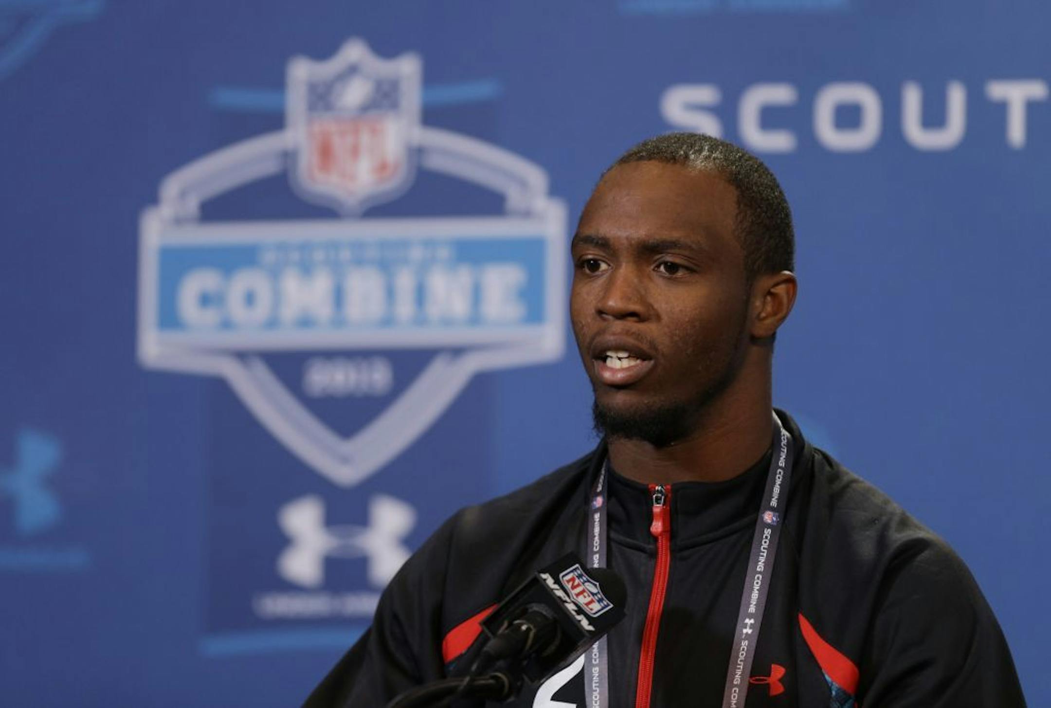West Virginia receiver Tavon Austin answers a question during a news conference at the NFL scouting combine.