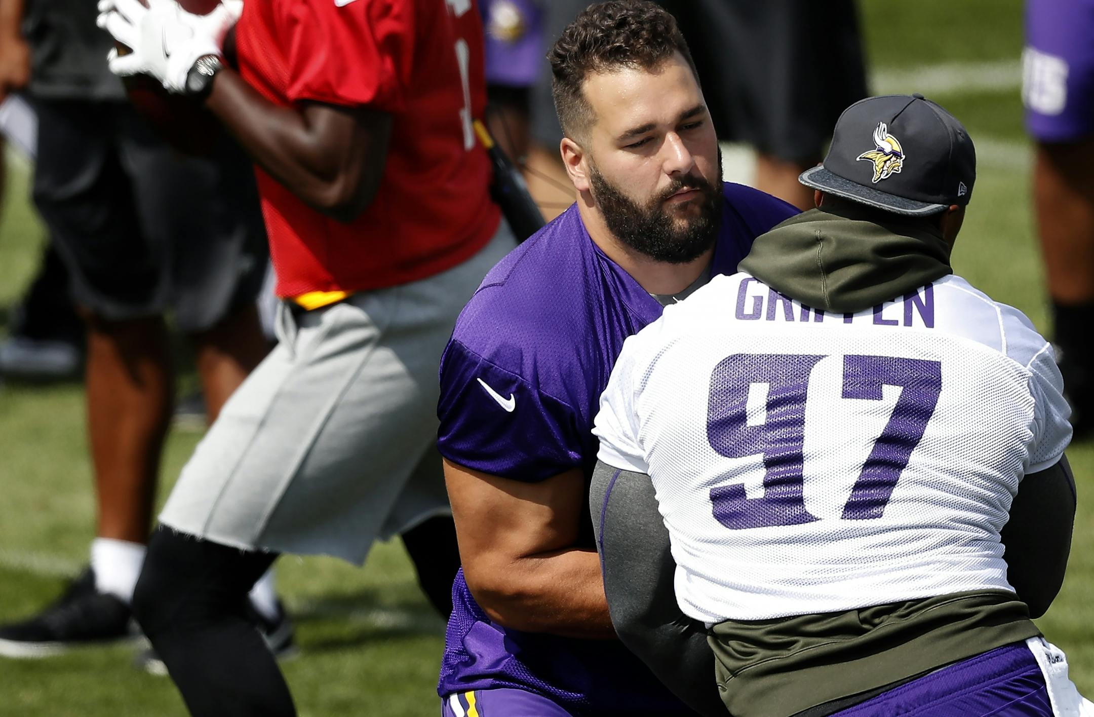 Tackle Matt Kalil and defensive end Everson Griffen (97) during the morning practice.