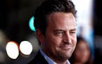 FILE - Matthew Perry arrives at the premiere of "The Invention of Lying" in Los Angeles on Sept. 21, 2009. Perry turns 53 on Aug. 19. (AP Photo/Matt S