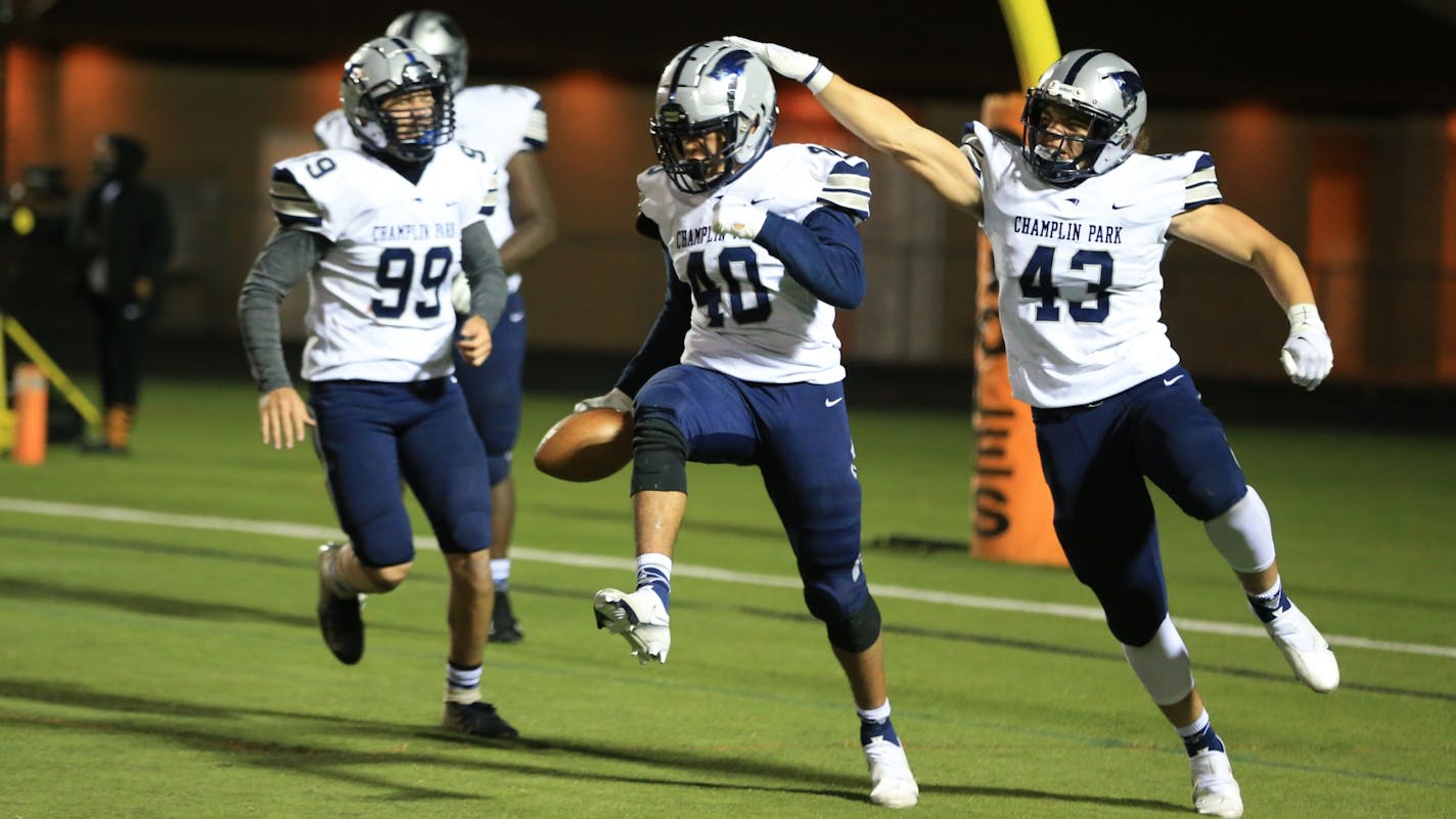 Champlin Park safety DJ Myles celebrated scoring a touchdown after blocking an Osseo punt on Oct. 15. The Anoka-Hennepin school board on Monday overruled a move that would have put sports and extracurriculars on hold starting Nov. 2.