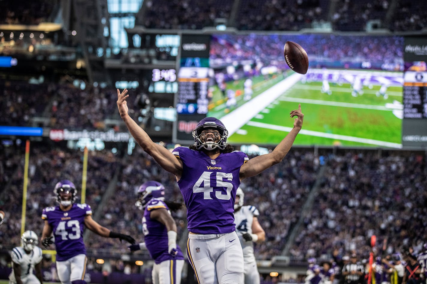 Minnesota Vikings linebacker Troy Dye (45) celebrated his 33 yard interception for a touchdown in the first quarter.] Jerry Holt •Jerry.Holt@startribune.com