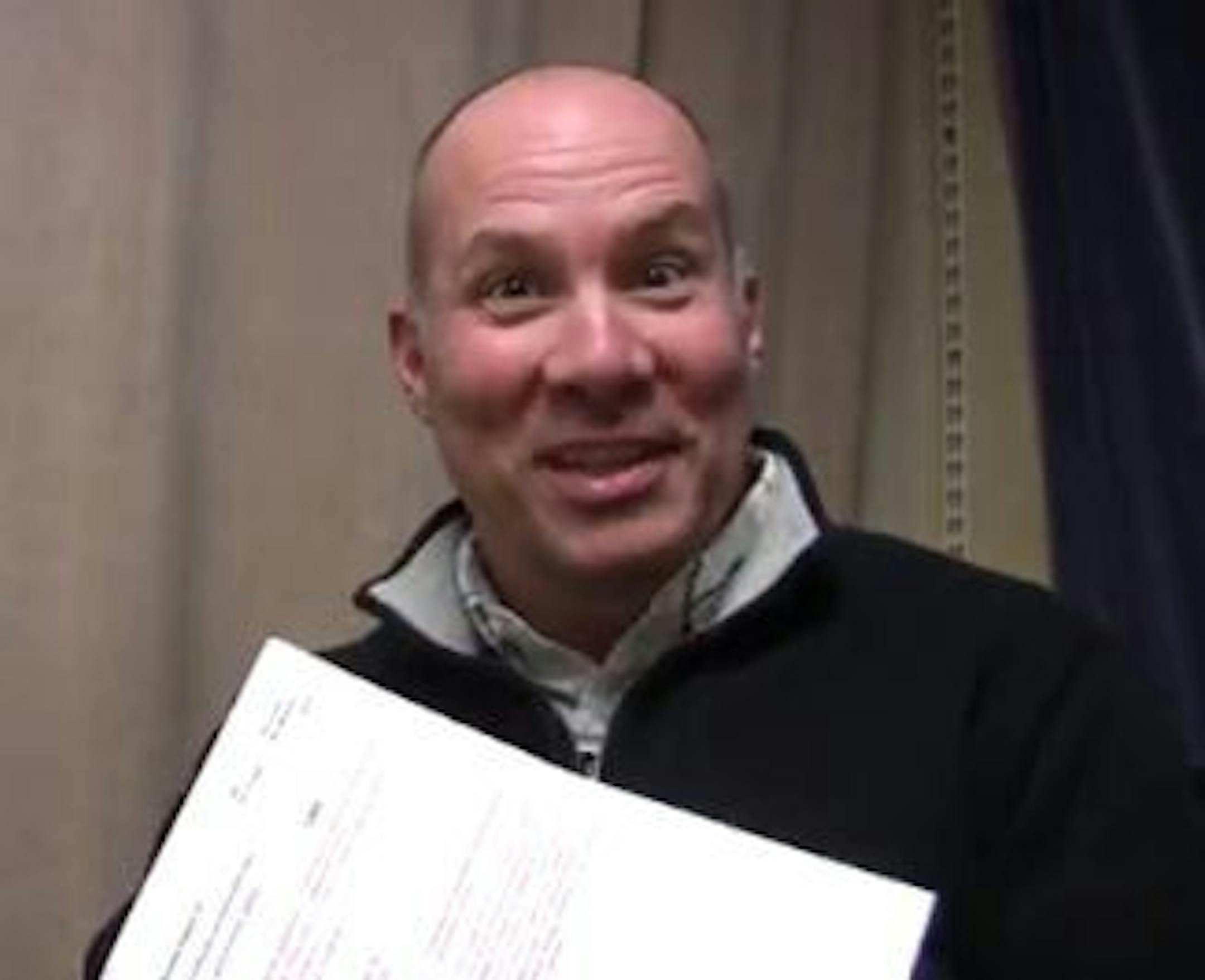 Dave Kent does much of evening child care duty for his family, because mom Kelcey Carlson's workday at Fox 9 begins in the afternoon and doesn't end until after bath time and bedtime.