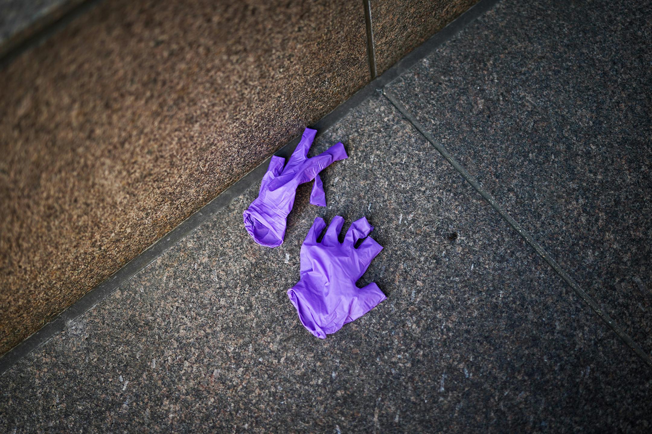 A discarded pair of protective rubber gloves along 5th Street in Minneapolis.