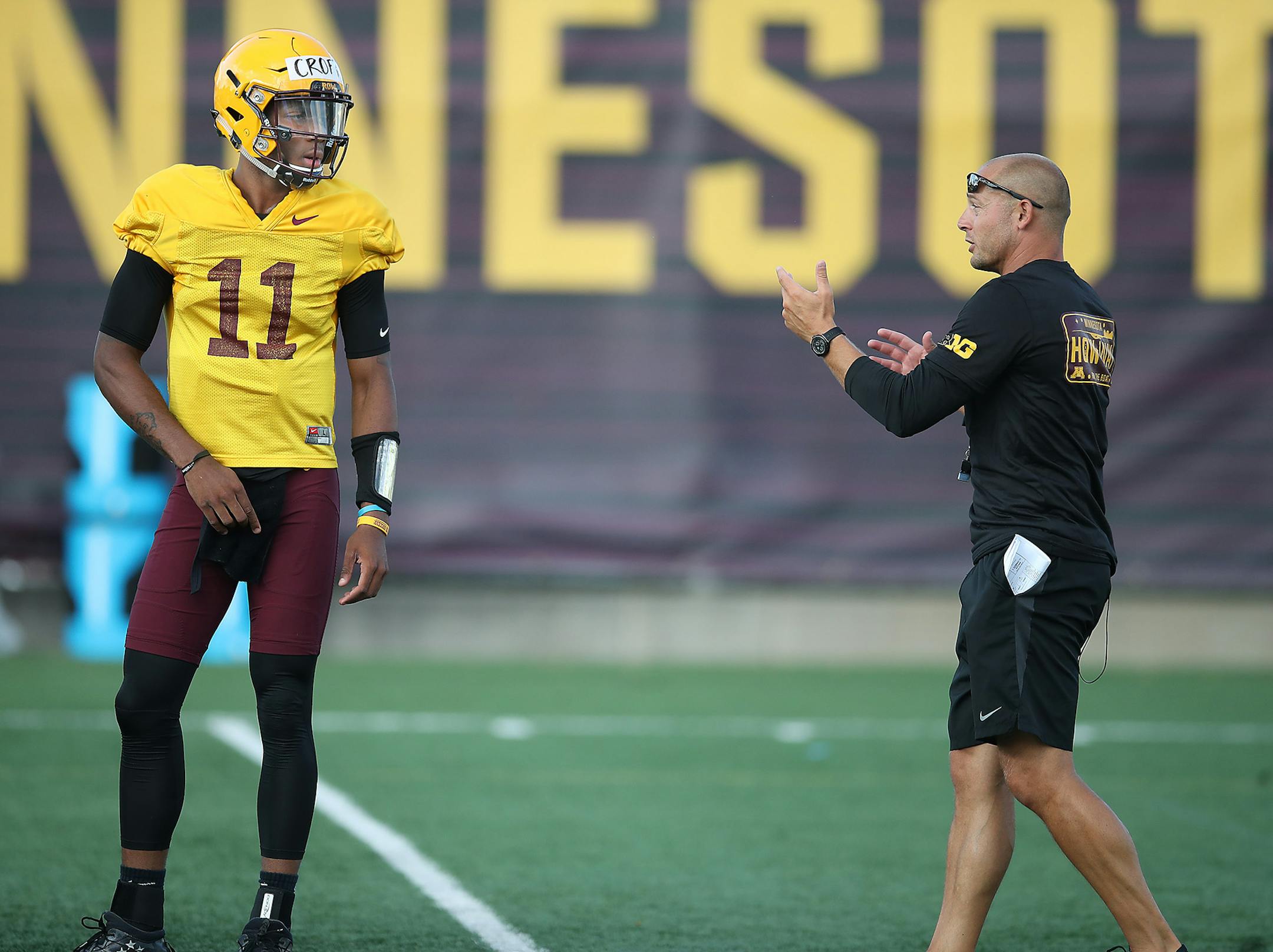 Quarterback Demry Croft took direction from Gophers Head Coach P.J. Fleck during the Gophers football practice at Gibson-Nagurski Football Complex, Friday, August 4, 2017 in Minneapolis, MN. ] ELIZABETH FLORES ï liz.flores@startribune.com