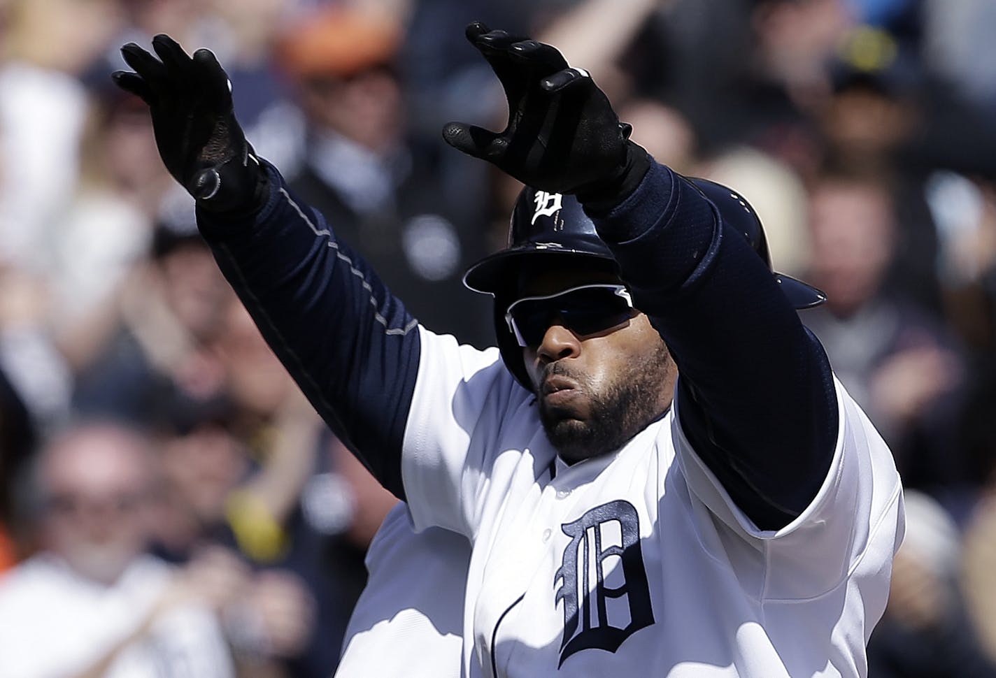 Detroit Tigers' Prince Fielder celebrates his three-run home run against the New York Yankees in the fifth inning of a baseball game in Detroit, Friday April 5, 2013. (AP Photo/Paul Sancya)