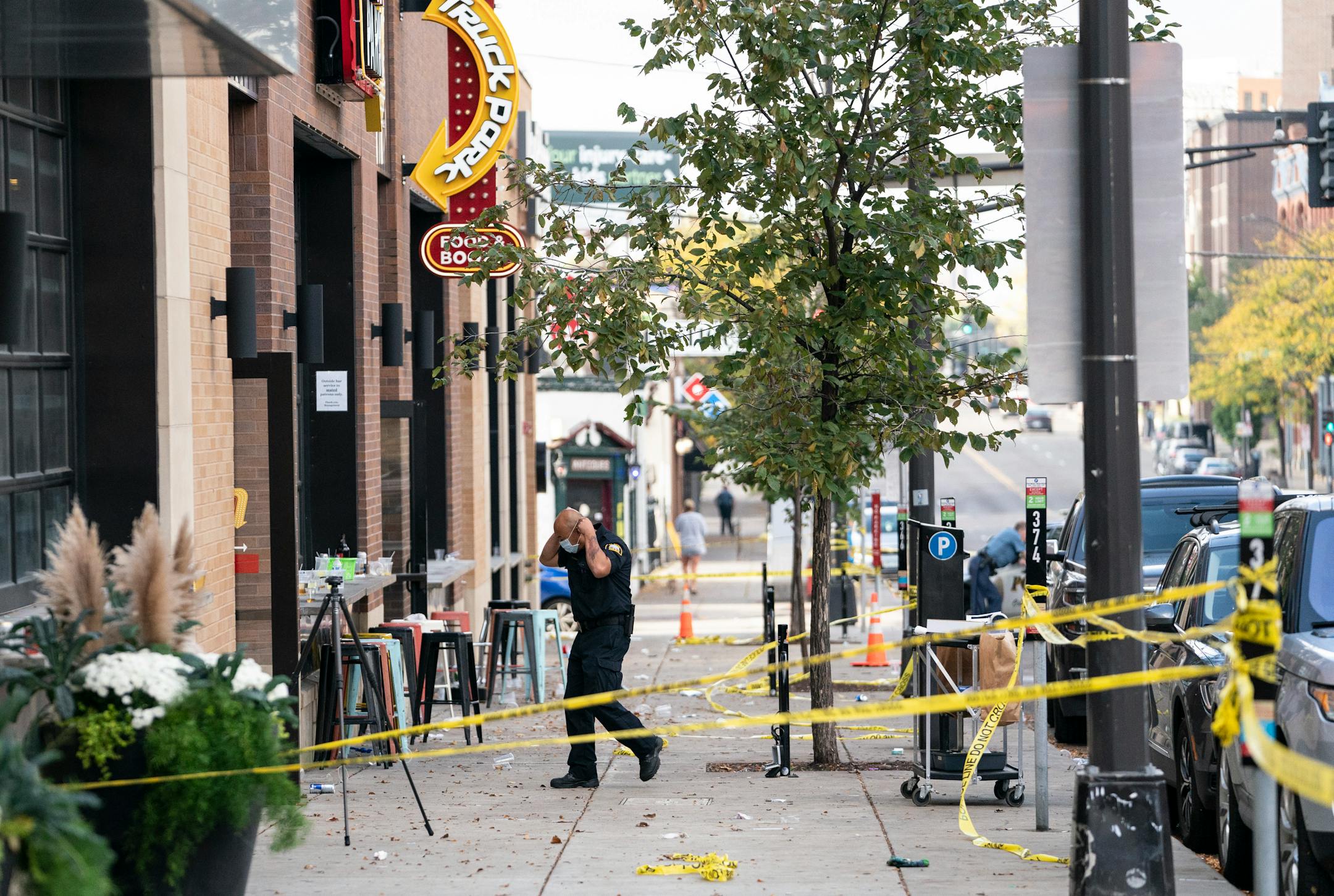 Investigators processed the chaotic scene of a multiple shooting at the bar Truck Park in St. Paul, Minn., that happened after midnight on Sunday, October 10, 2021.