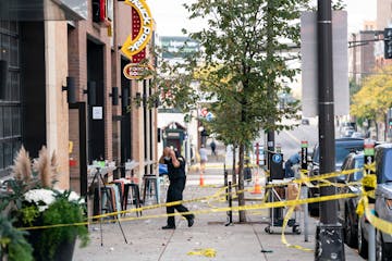 Investigators processed the chaotic scene of a multiple shooting at the bar Truck Park in St. Paul, Minn., that happened after midnight on Sunday, Oct