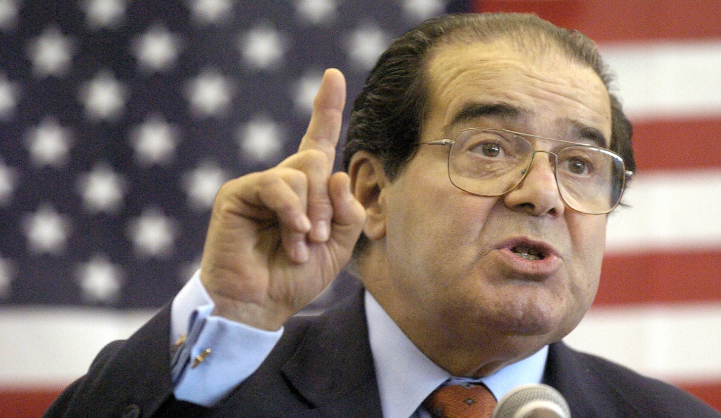 FILE - In this Wednesday, April 7, 2004 file photo, U.S. Supreme Court Justice Antonin Scalia speaks to Presbyterian Christian High School students in Hattiesburg, Miss. On Saturday, Feb. 13, 2016, the U.S. Marshall's Service confirmed that Scalia has died at the age of 79. (Gavin Averill/The Hattiesburg American via AP) ORG XMIT: MIN2016021316461821