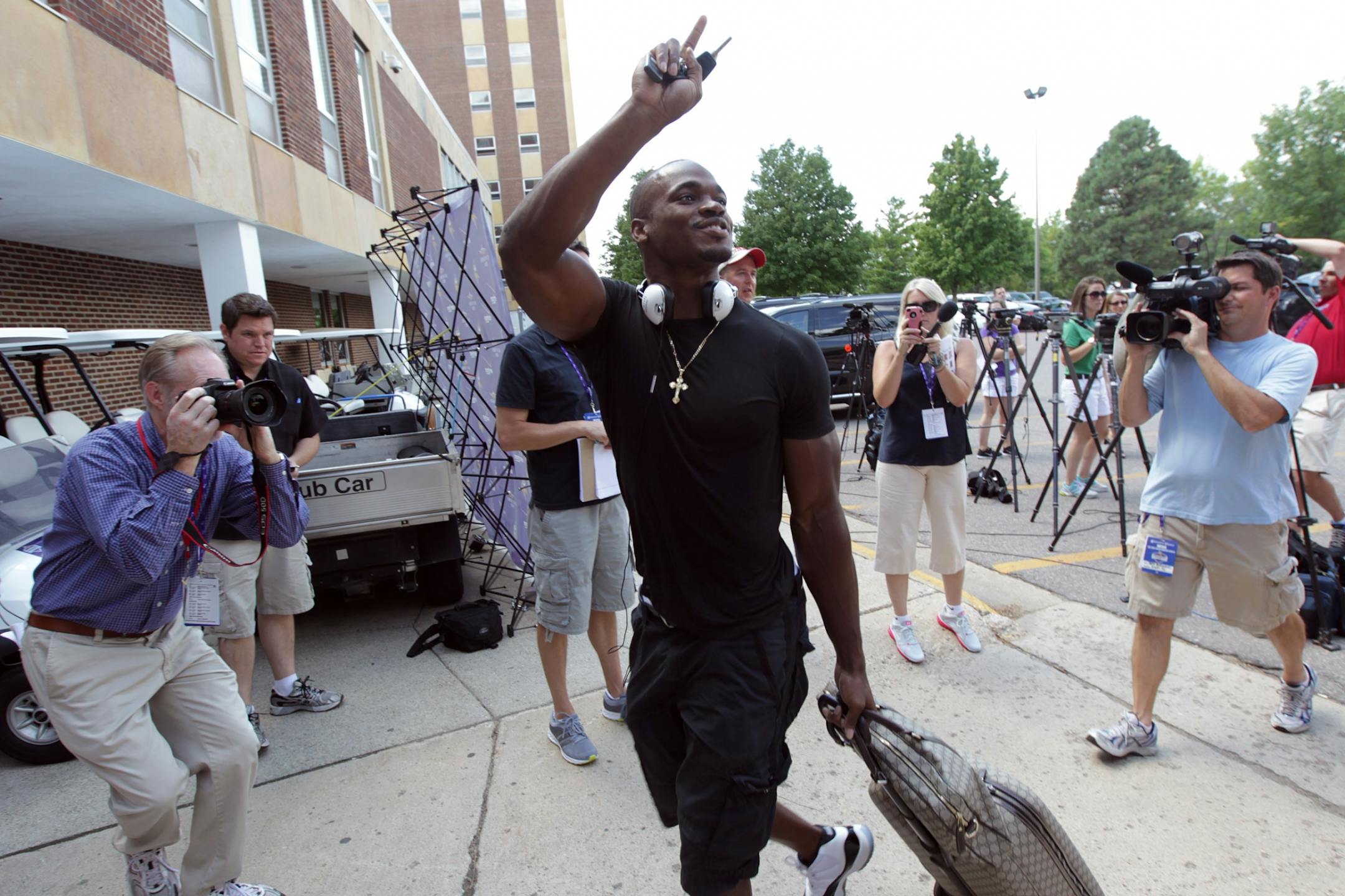 Vikings running back Adrian Peterson arrived at Gage Hall as Vikings players report for football camp Thursday July 26, 2012 Mankato ,MN .