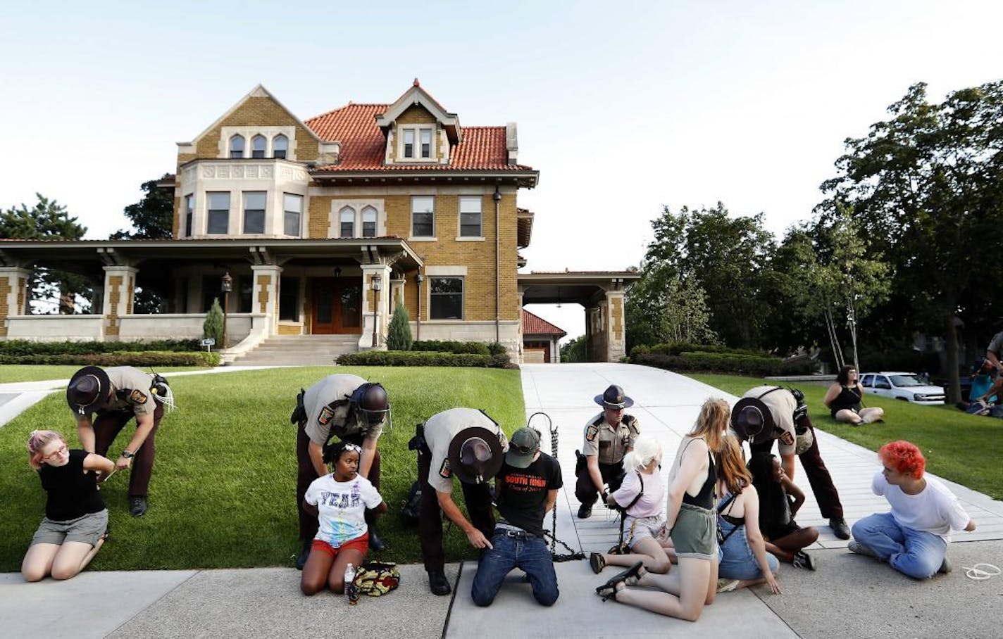 More protesters were arrested Tuesday night near the governor's residence on Summit Avenue in St Paul.