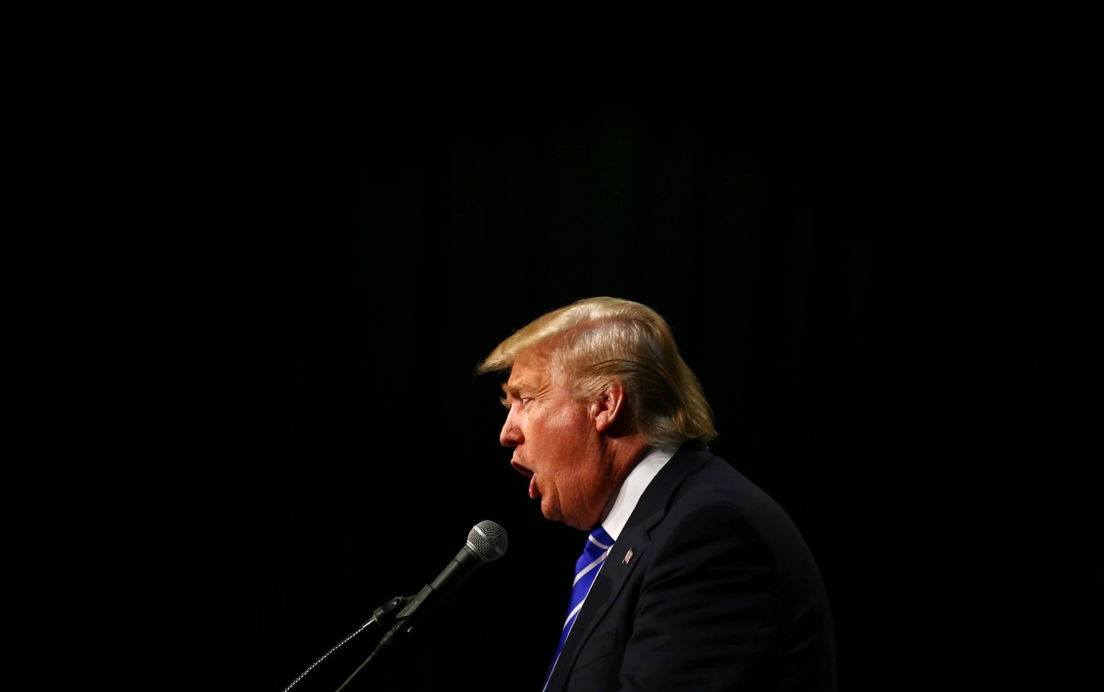 Republican presidential hopeful Donald Trump speaks at an Upstate Chamber Coalition event at the T.D. Convention Center in Greenville, S.C., Aug. 27, 2015. The South Carolina Republican Party has announced that it would require candidates to pledge their support to the ultimate Republican nominee in order to compete in the state’s critical primary, but Trump has still not signed the pledge. (Travis Dove/The New York Times)
