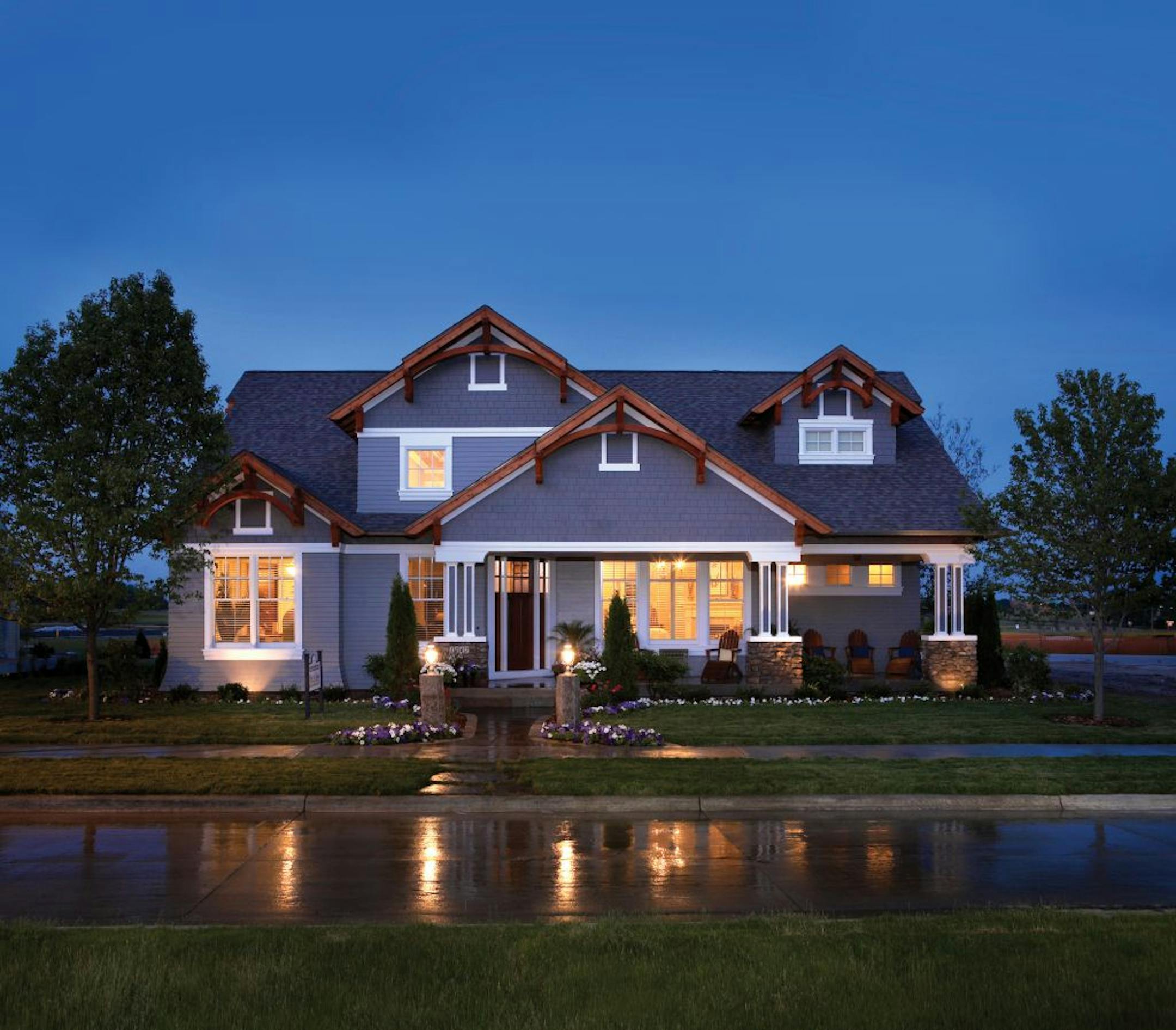 Luxurious details fill this modified ranch-style house.