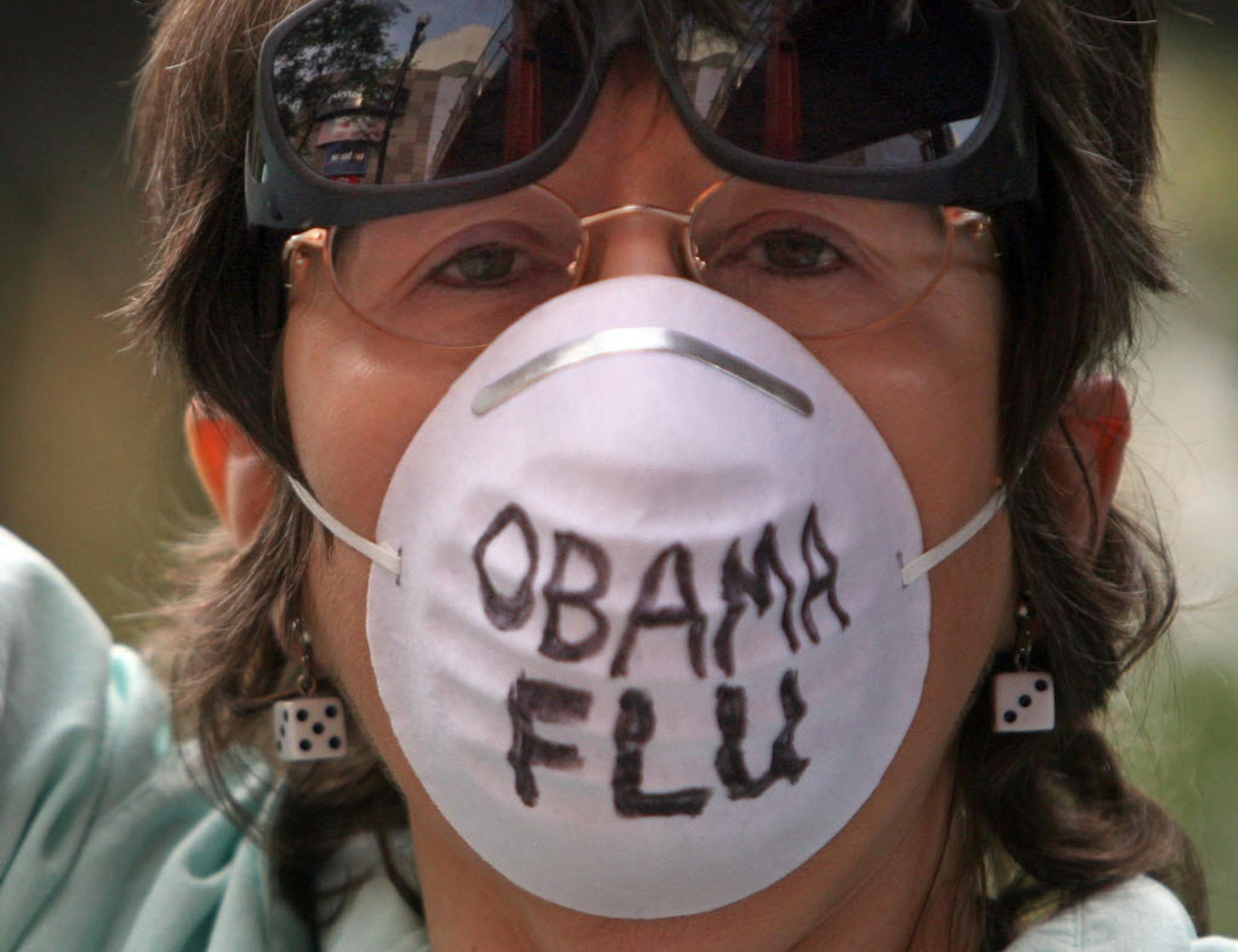 A protester from Inver Grove Heights who called herself a disgruntled Democrat stood outside of Target Center this morning where President Obama was to speak about health care.