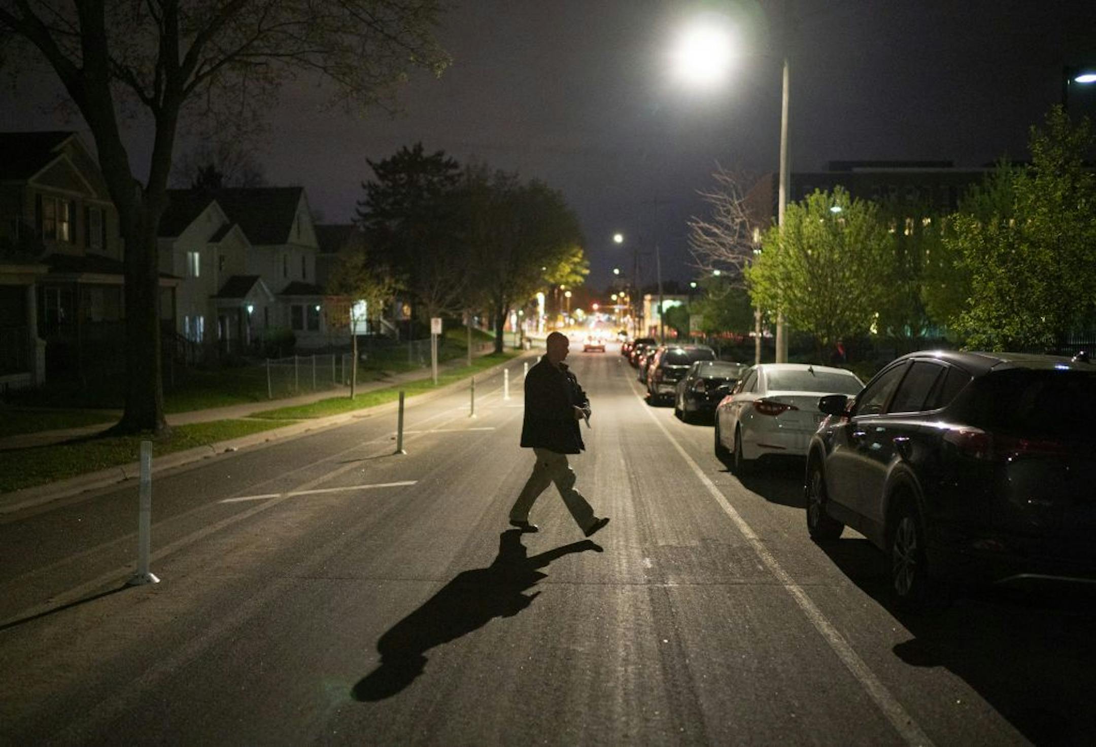 ISR Agent Ricardo Defiel walked back to his car after making a random visit to a former prison inmate on supervised release in north Minneapolis late Monday night.