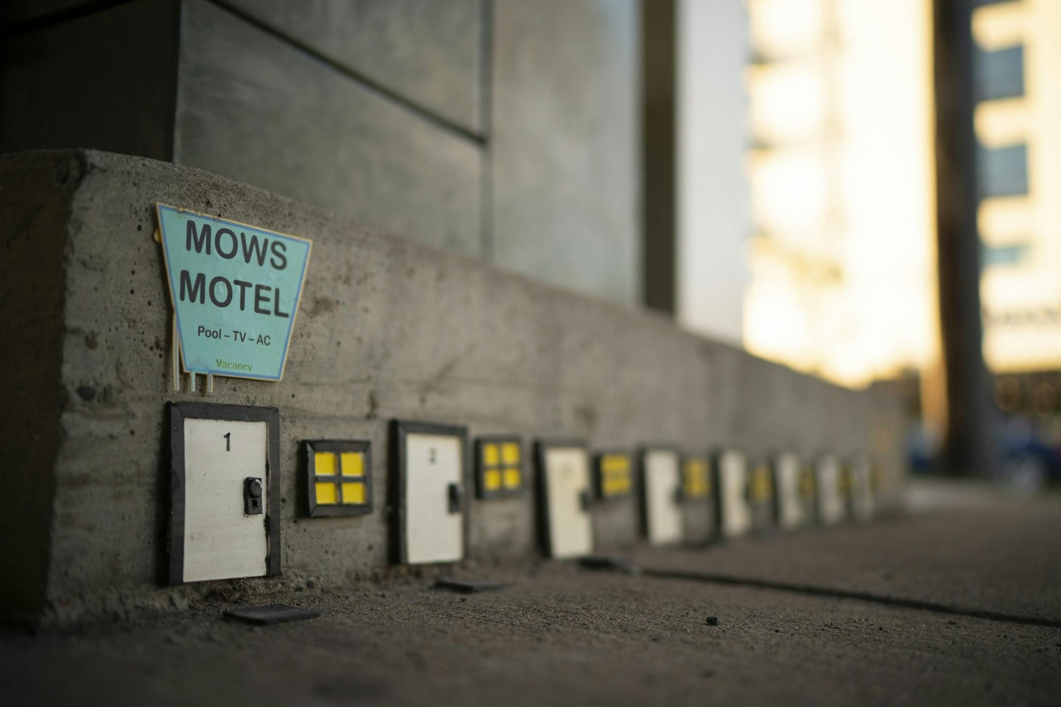 The Mows Motel, a multi-door installation on 6th Ave. N. in Minneapolis.