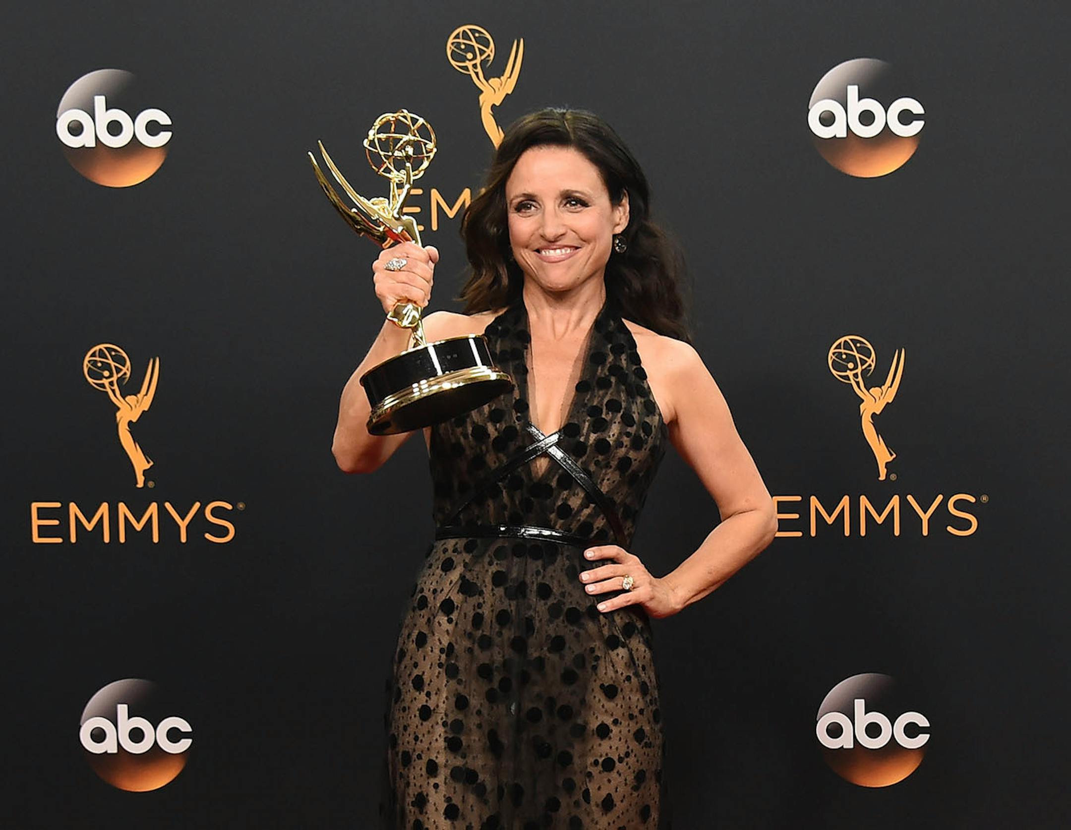 Julia Louis-Dreyfus winner of the award for outstanding lead actress in a comedy series for "Veep" poses in the press room at the 68th Primetime Emmy Awards on Sunday, Sept. 18, 2016, at the Microsoft Theater in Los Angeles.