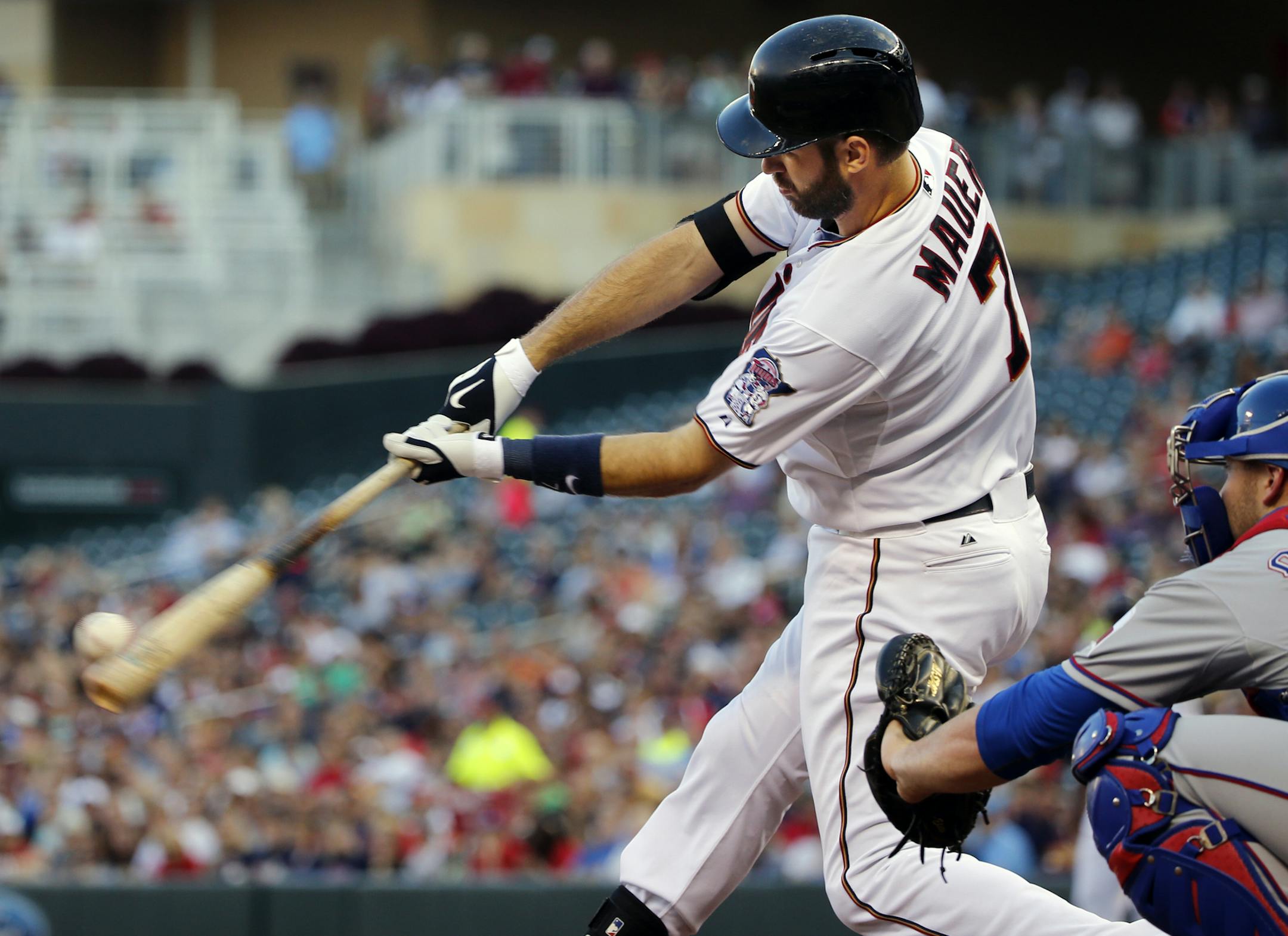 Joe Mauer(7) singled to right in the first inning] At Target Field in a game between the Twins and the Rangers.Richard Tsong-Taatarii/rtsong-taatarii@startribune.com