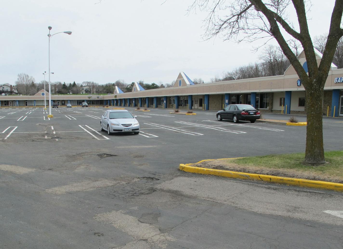 The Valley Ridge strip mall on Burnsville Parkway, built in 1977, is mostly vacant. There are plans to redevelop it as a senior apartment building and an assisted living facility. Photo: Katie Humphrey ORG XMIT: MIN2014070315191160